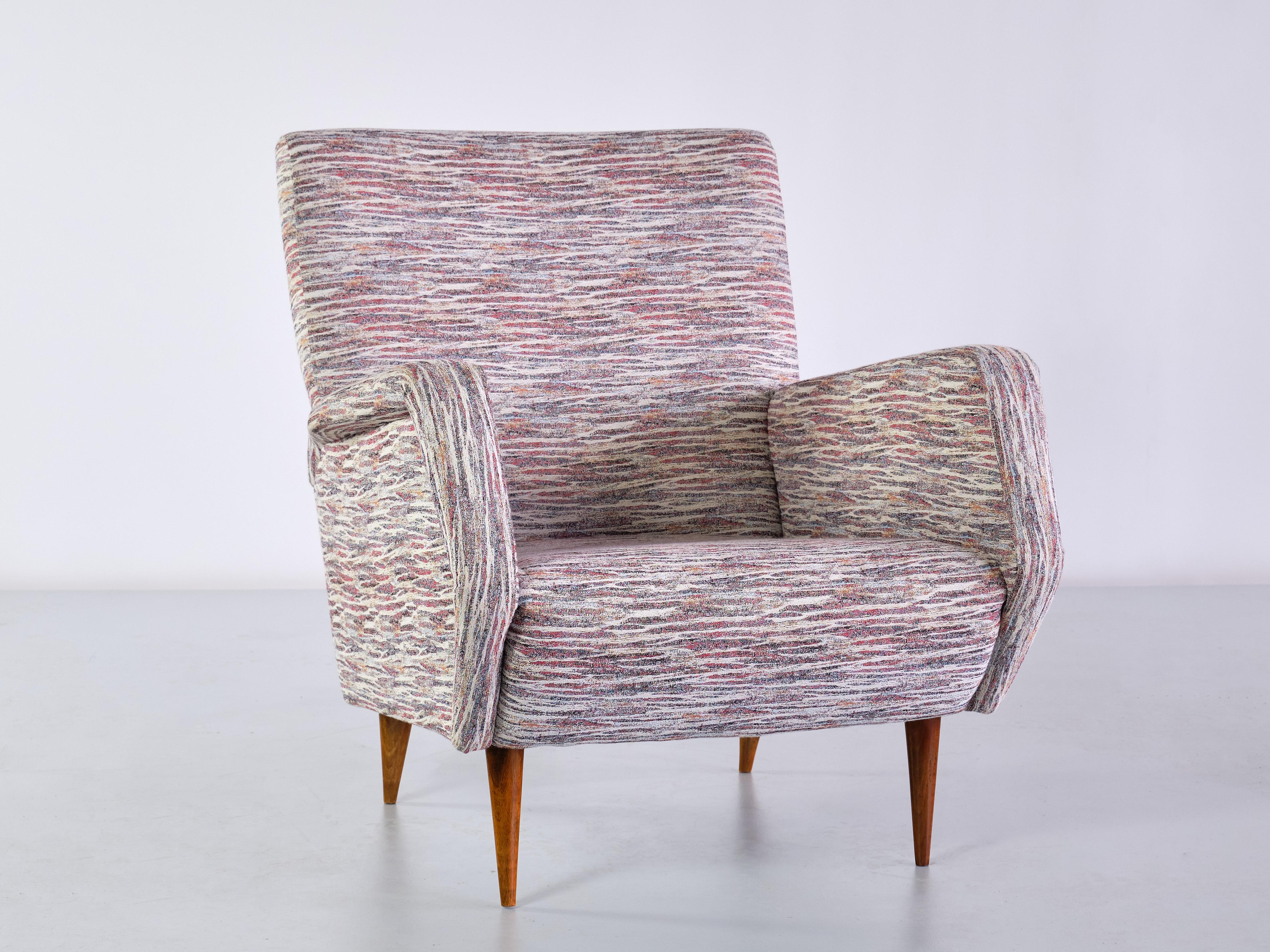 This rare armchair was designed by Gio Ponti and produced by Cassina, Italy in 1954. The model was numbered 803 and is one of the most iconic and recognizable Ponti designs produced by Cassina in the 1950s. The design is marked by the slightly