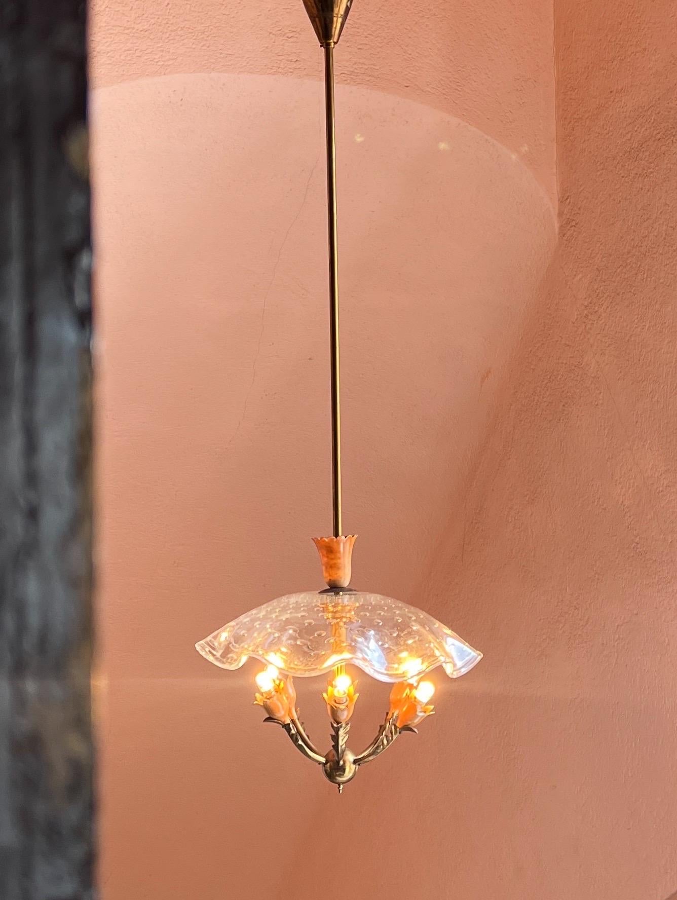 This stunning chandelier from the 1950s is said to be designed by none other than Gio Ponti himself. Picture this: a mesmerizing dotted Murano glass 