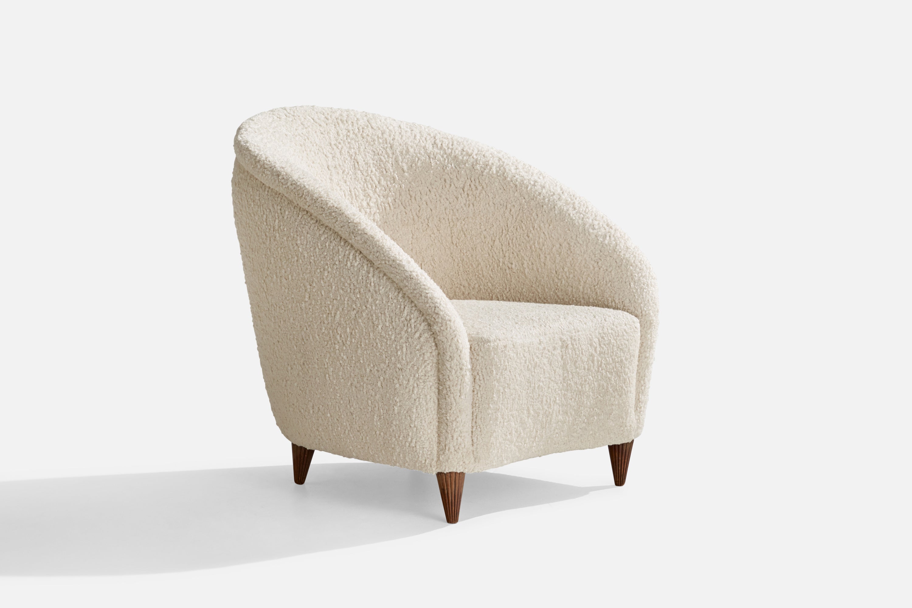 A white bouclé fabric and dark stained fluted walnut lounge chair attributed to Gio Ponti, Italy, 1940s.

seat height 13”.