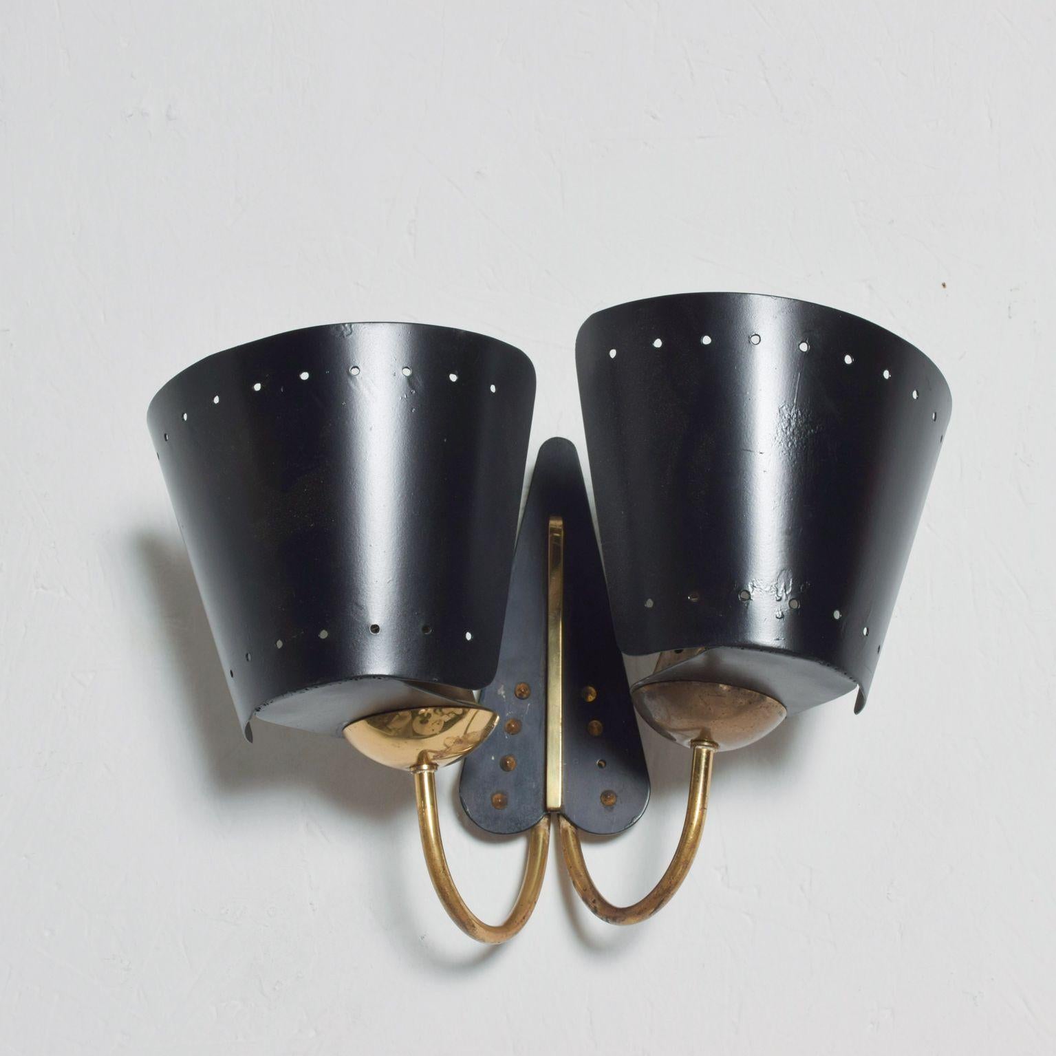 For your consideration: a Mid-Century Modern Italian double cone wall sconce in black attributed to the great Gio Ponti.

Made in Italy, unmarked, 1950s

Original unrestored preowned vintage item with visible wear. Please refer to
