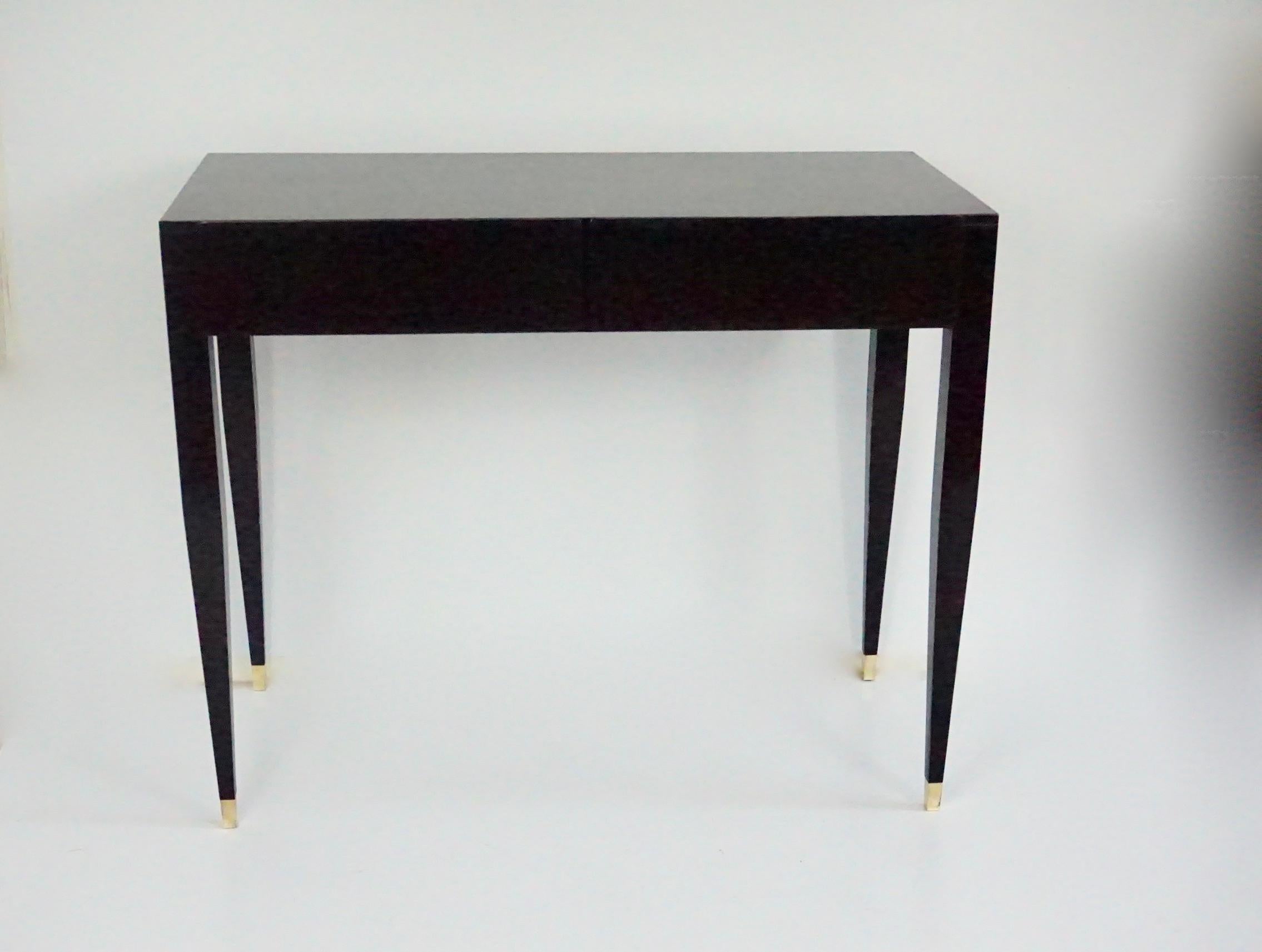 Elegant and rare Gio Ponti  black toilette, vanity table - dressing table
produced by Giordano Chiesa for the Hotel Royal , 1955

Black lacquered Italian ash, brass, two drawers  
brass feet 
Measures: H 78cm, 95 x 46.5 cm; top: 45 x 94.5 cm
total