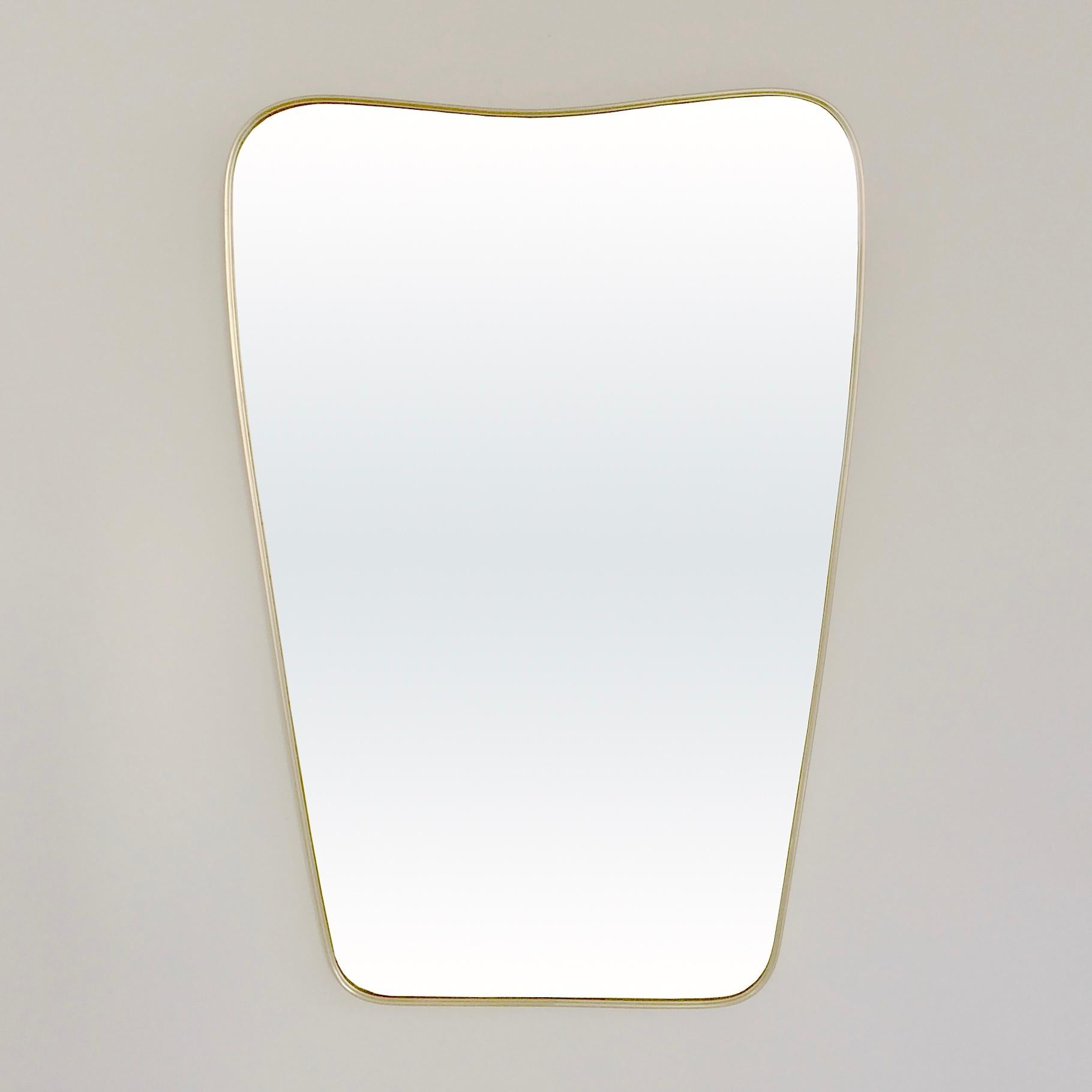 Gio Ponti large mirror, circa 1950, Italy.
Polished brass, mirror.
Dimensions: 96 cm H, 66 cm W, 3 cm D.
Rare item in is original condition.
All purchases are covered by our Buyer Protection Guarantee.
This item can be returned within 7 days of