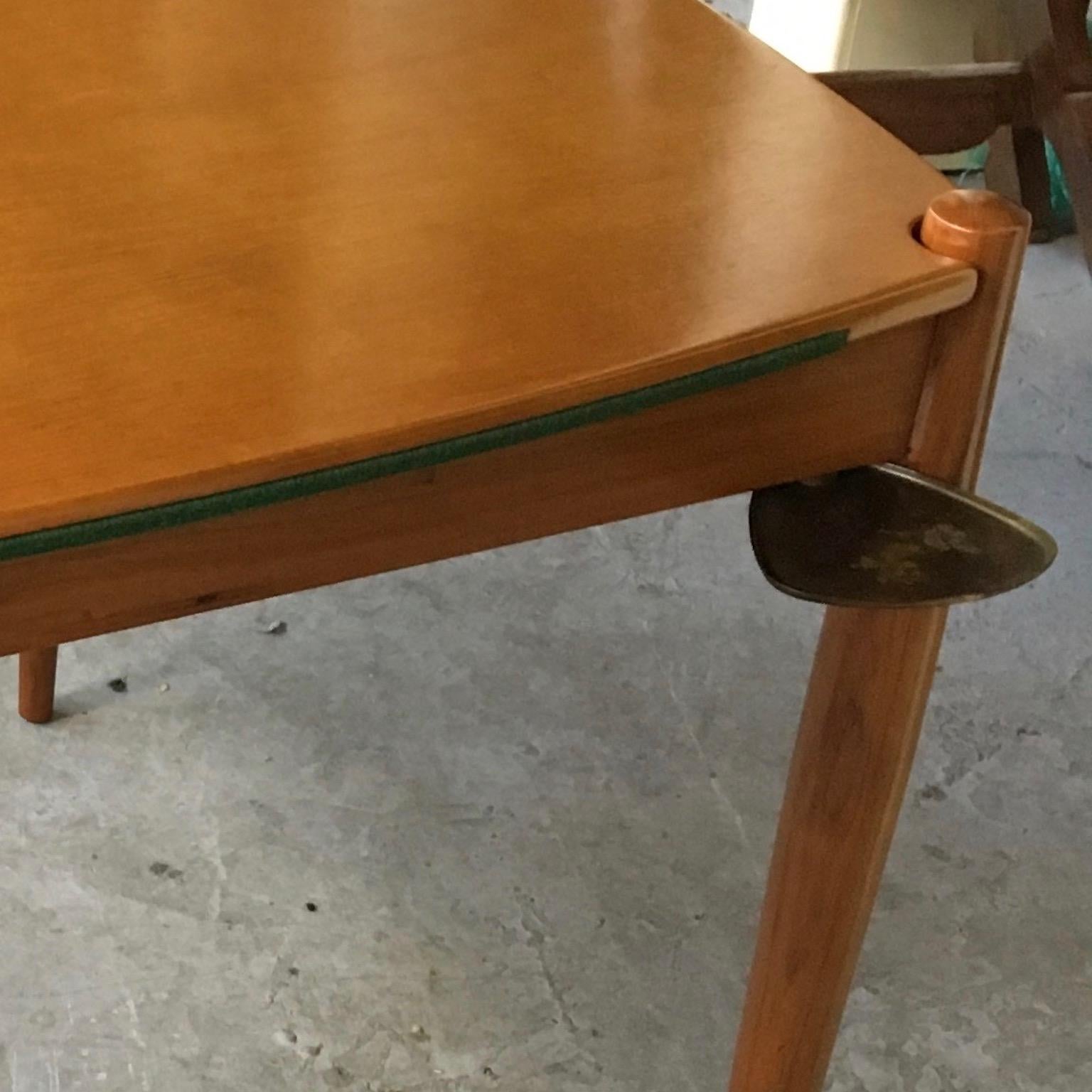 Gio Ponti walnut games table with green felt on the reverse. Extremely practical size. Wood has been professionally restored but brass glass holders are in original condition, we can refinish before shipping if desired. Made by Reguitti Italy.