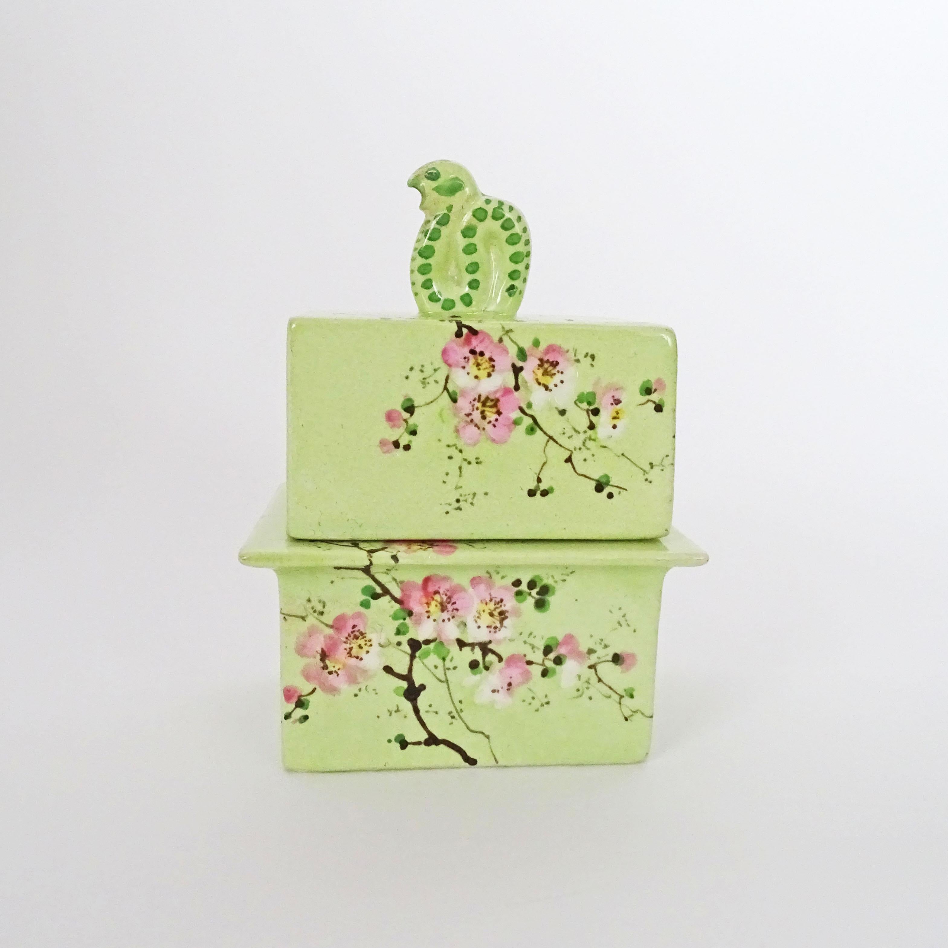 Gio Ponti Ceramic Cigarette Box for Richard Ginori Italy 1930s
The box was later ( 1940s ) repainted in light green with flower blossoms.

