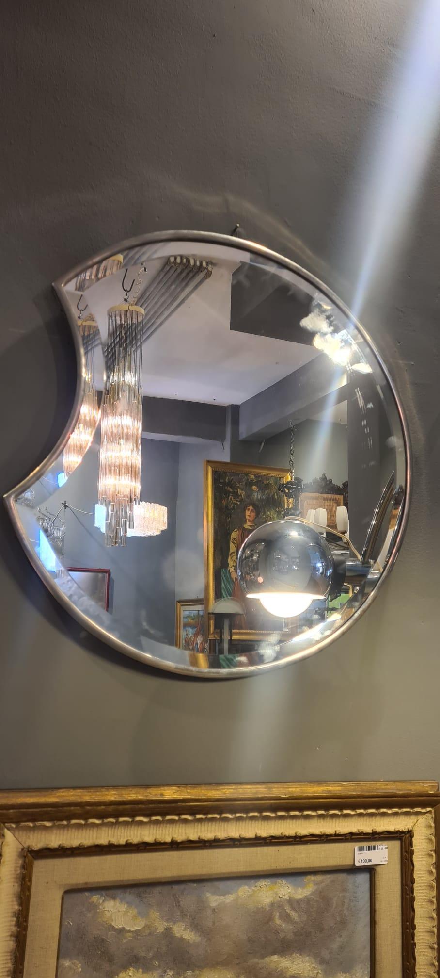 Mirror in chromed brass Italian production of the 30s in full art deco style attributable to the Italian designer Giò Ponti.