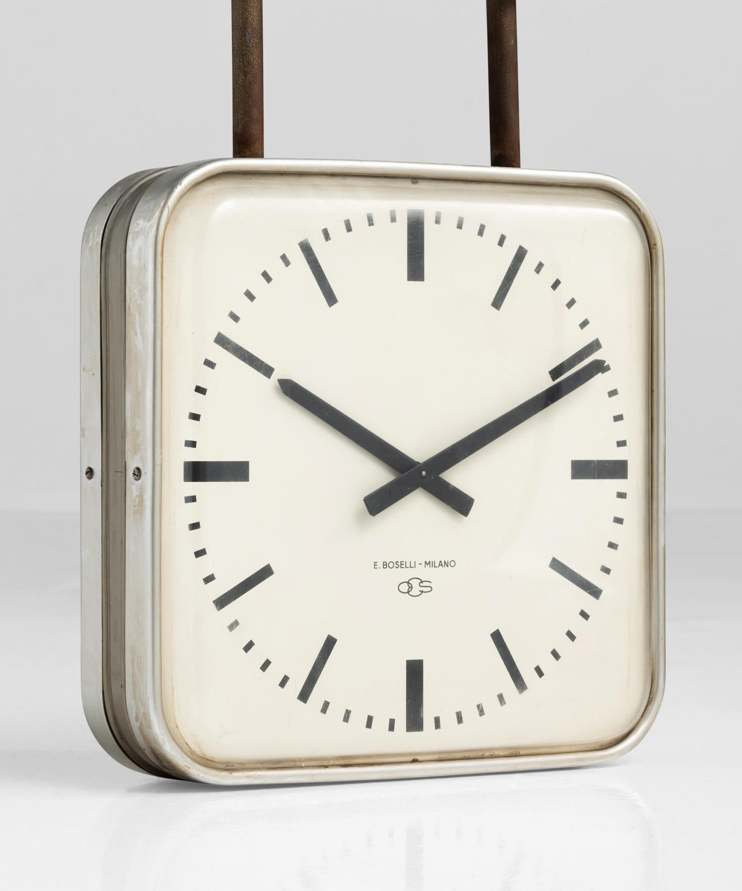 Gio Ponti Clock, Italy circa 1960.

Double-sided wall or ceiling clock. Designed for the Uffizi office in Montecatini.