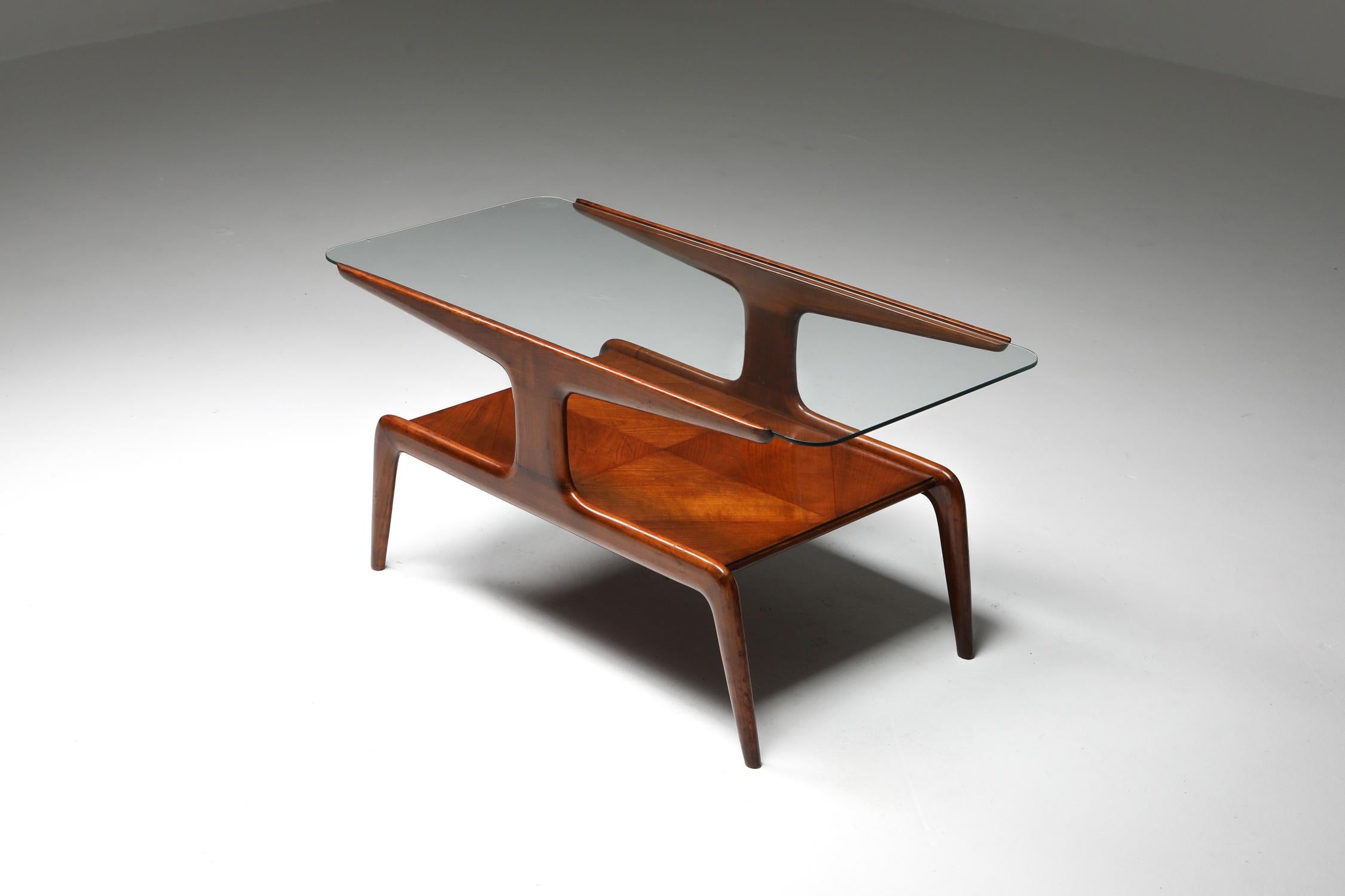 Gio Ponti, walnut, coffee table, Italy, circa 1950

Midcentury Italian design two-tier coffee table by Gio Ponti.
Sculptural and elegant design by this Italian grandmaster.

Giovanni 