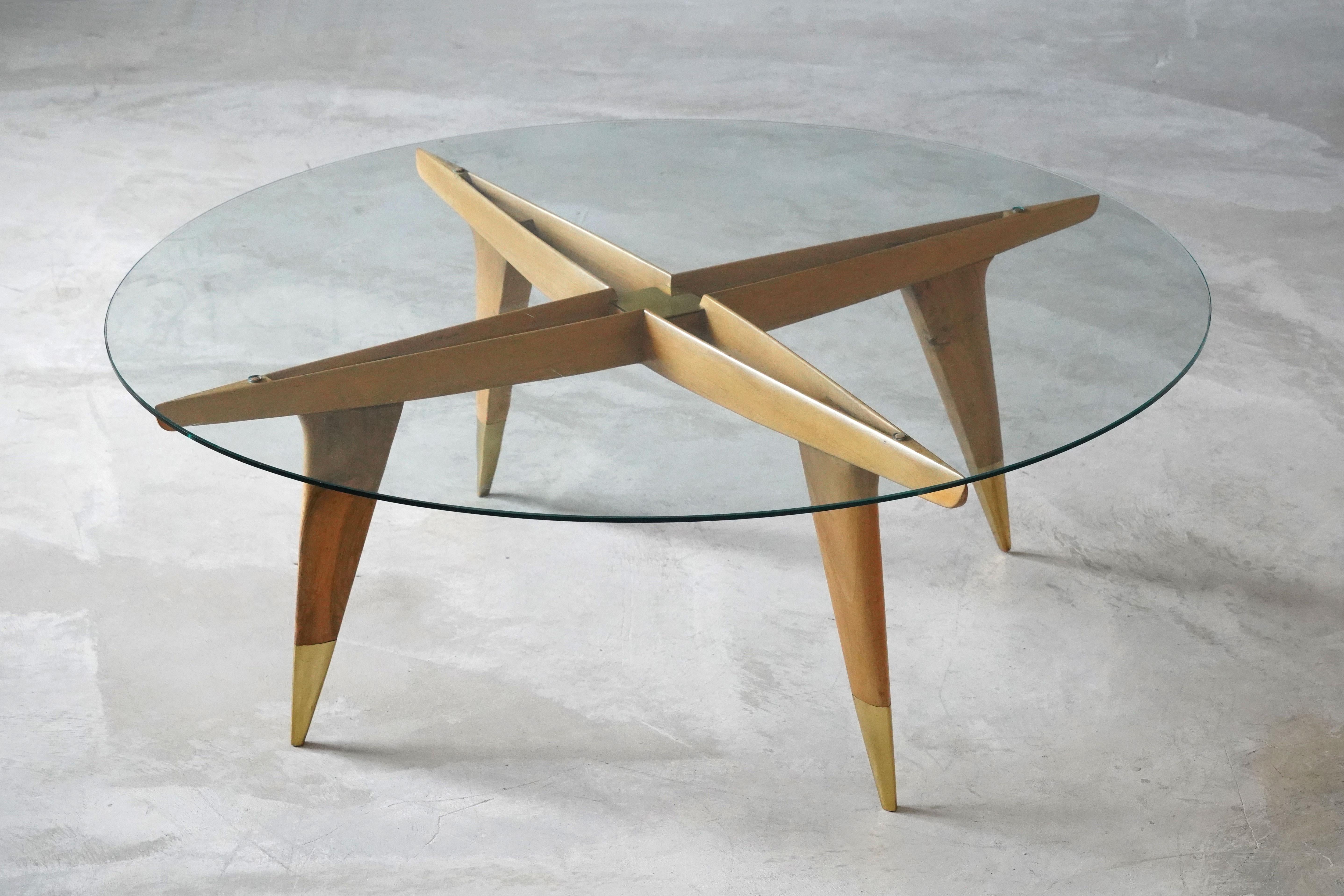 An iconic and rare coffee / cocktail table. Designed by Gio Ponti in his signature style. Production of studio-level quality carried out in the 1950s by M. Singer & Sons, New York, America. 

Other designers of the period include Ico Parisi, Jean