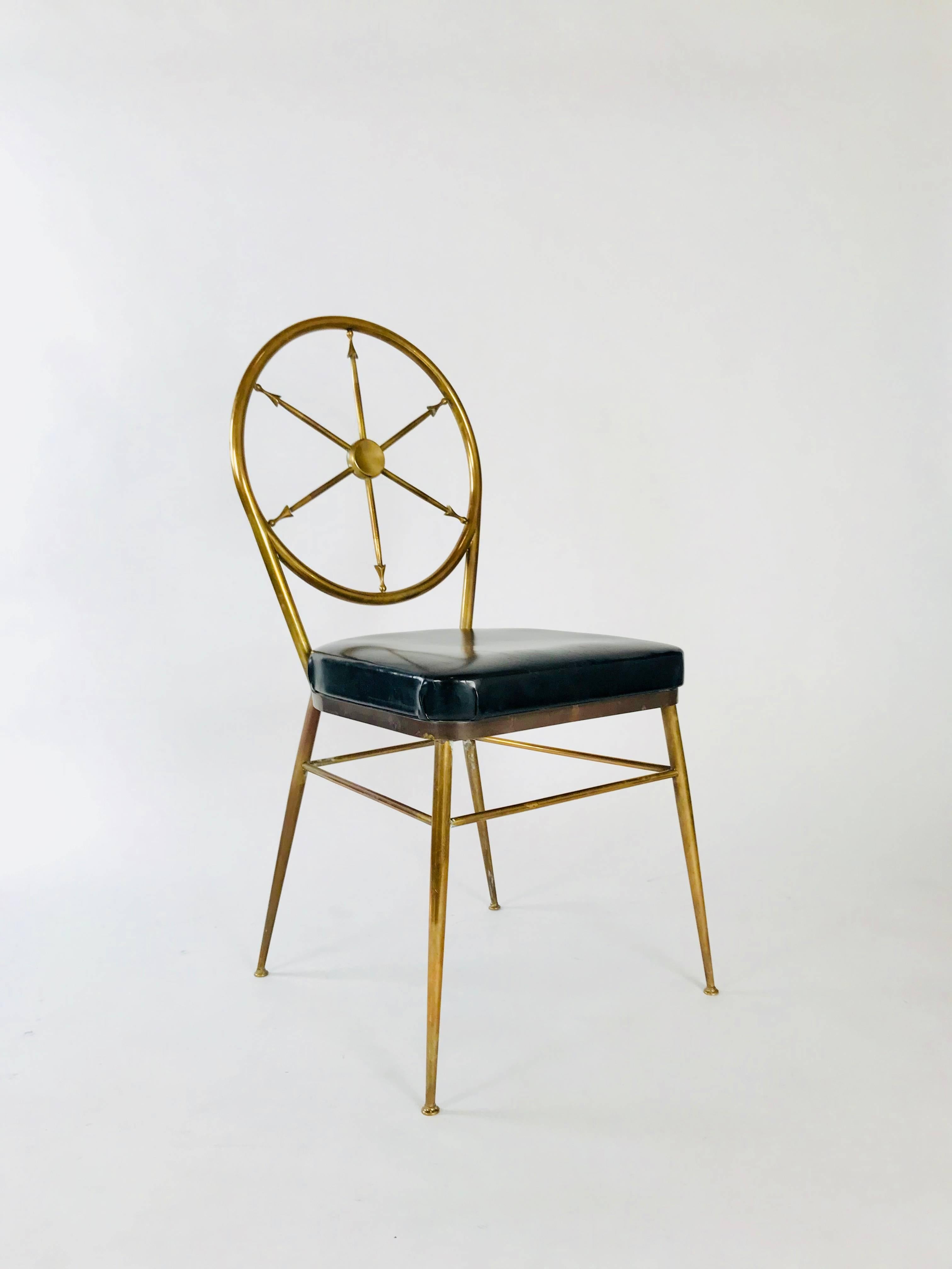 Brass compass back chair attributed to Gio Ponti. Original black patent leather seat and a lovely patina to the heavy brass frame.