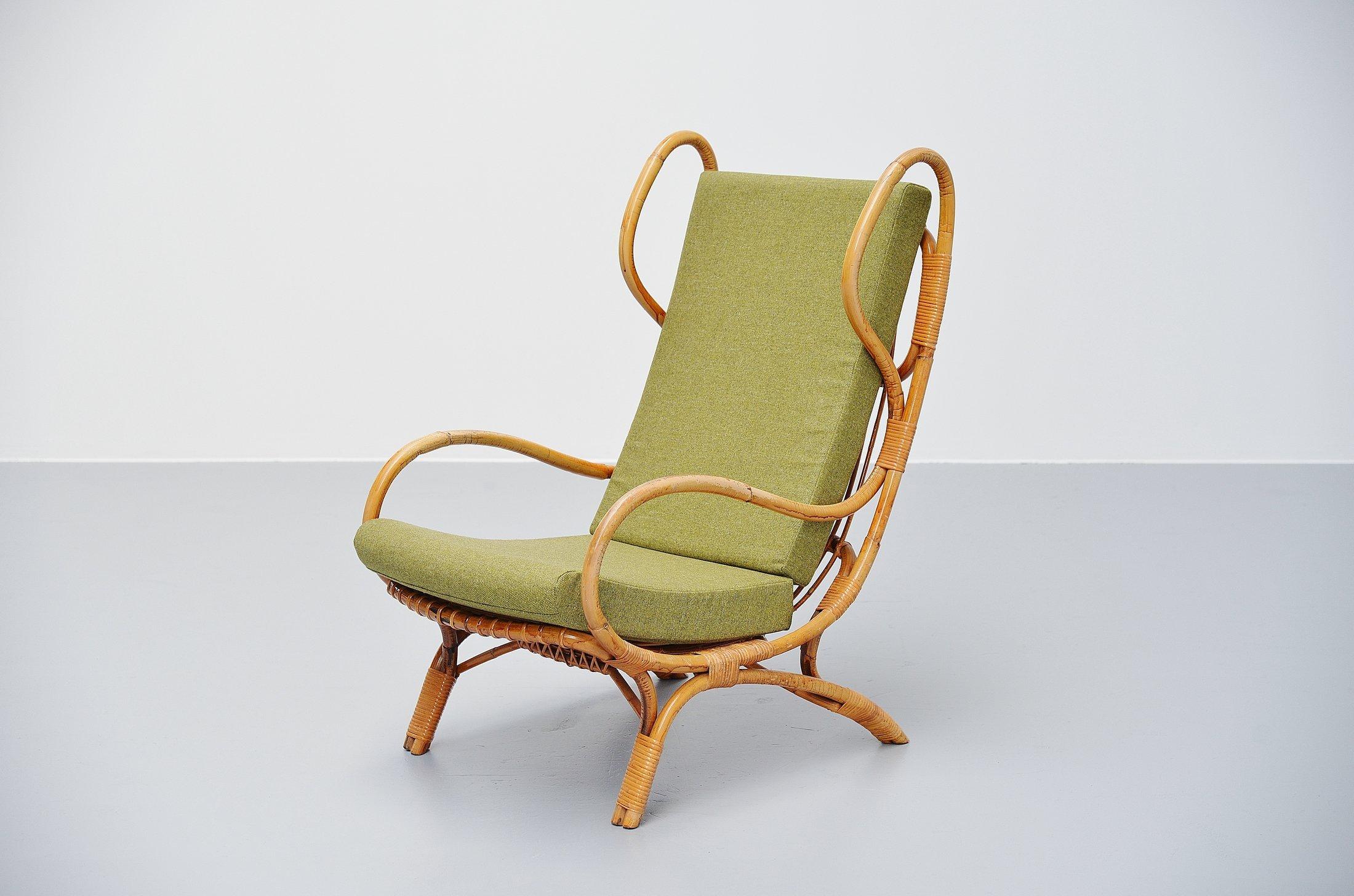 Rare rattan‘Continuum’ lounge chair model BP16 designed by Gio Ponti, manufactured by Bonacina, Lurago d’Erba, Como, Italy, 1963. The chair is completely made of rattanr and has newly upholstered green cushions. The chair is in extraordinary