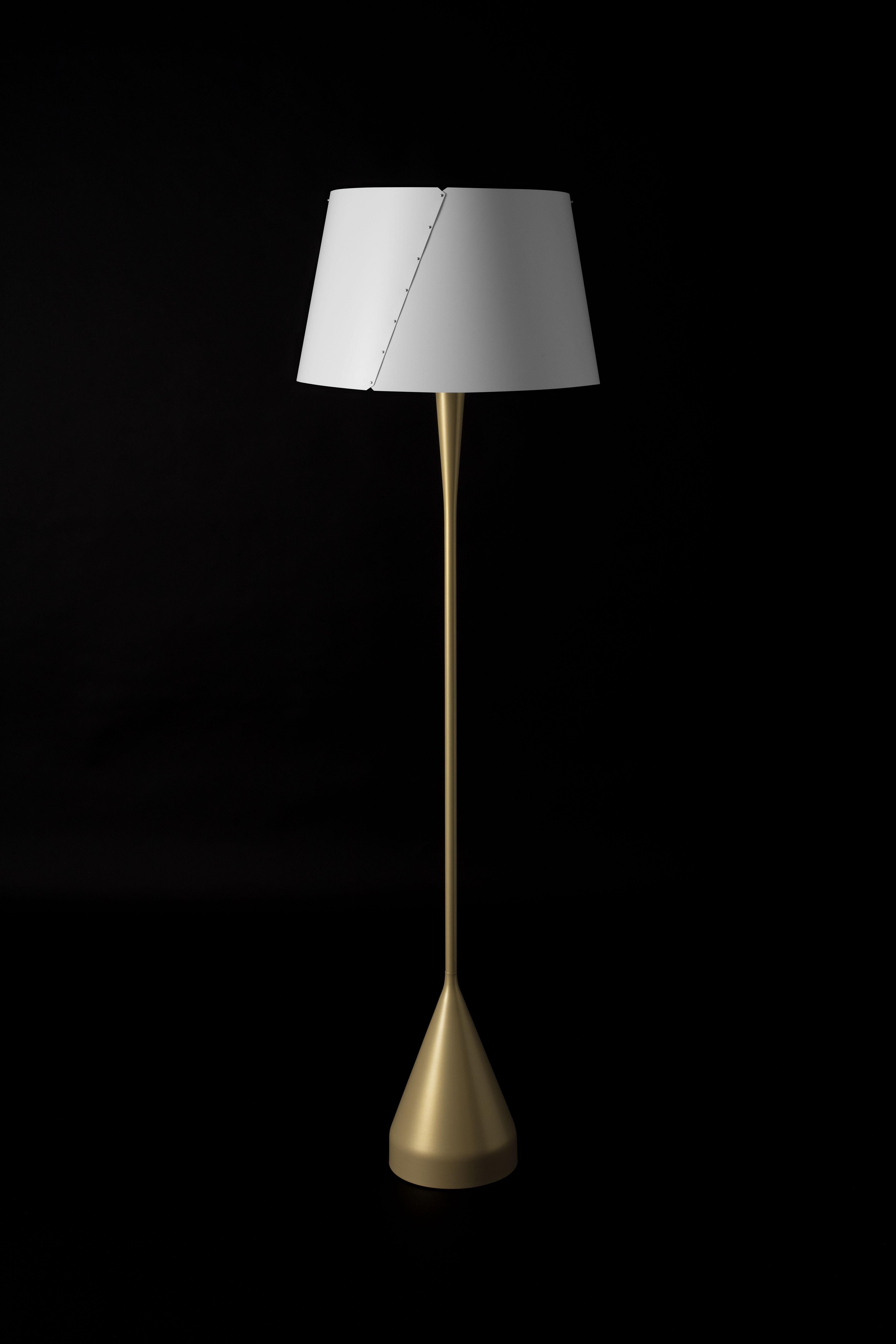 Gio Ponti De-Lux A4 floor lamp in gold for Tato Italia. 

Originally designed by Italian icon Gio Ponti in 1955, this authorized re-edition by Tato Italia is executed in aluminum and iron with a white polypropylene shade.

Price is per item.