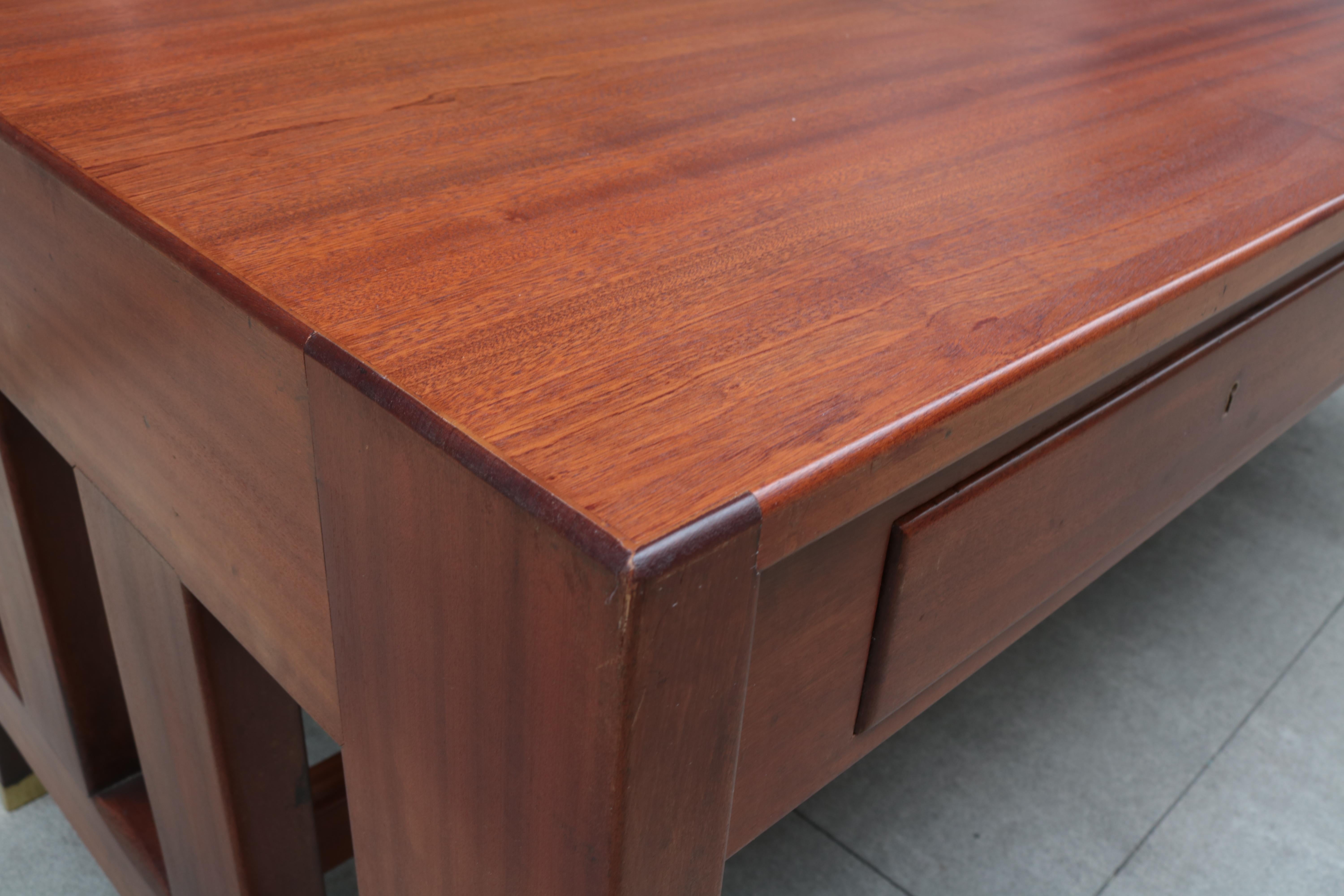 A large Gio Ponti designed three-drawer desk.
Mahogany with patinayed brass sabots.
The desk originally came from the
Banca Nazionale del Lavoro in Bergamo.
Comes with letter of authenticity from the Gio Ponti Archives.
 