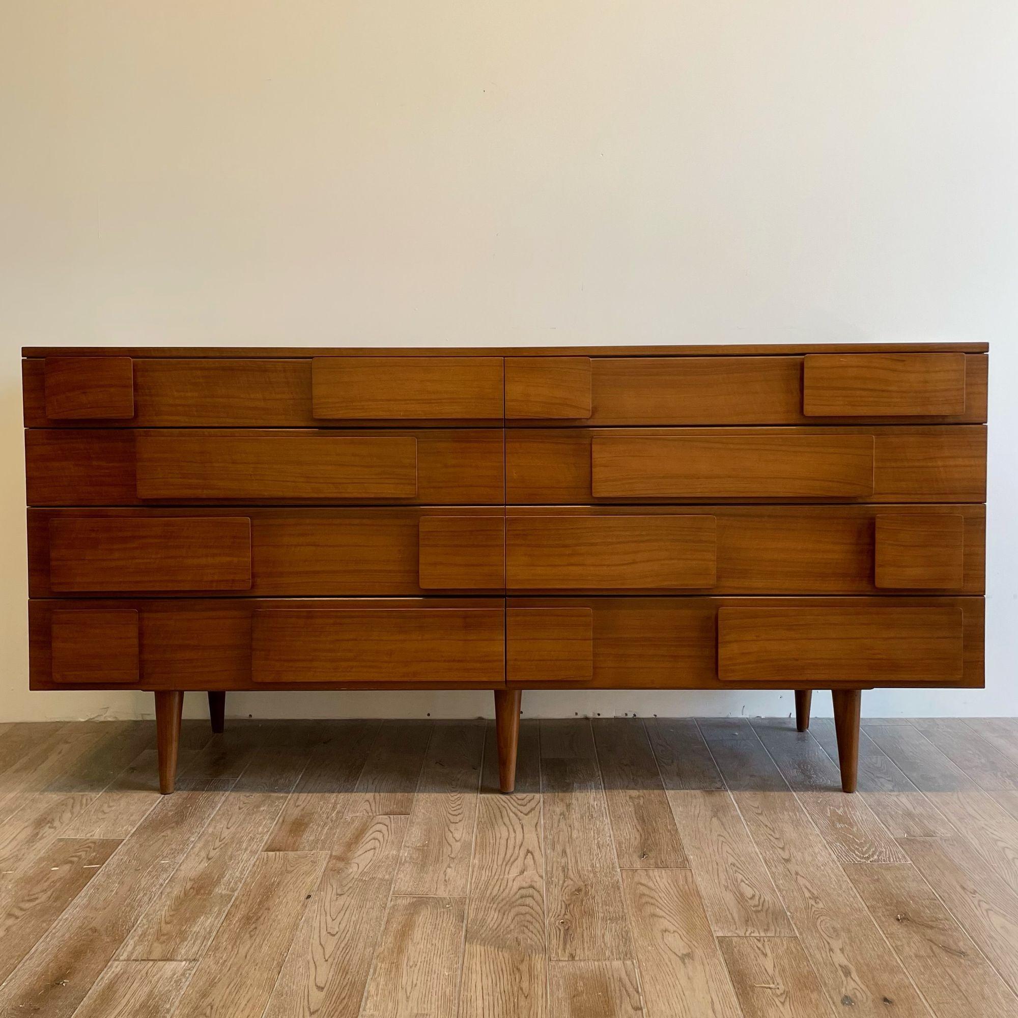 Gio Ponti double dresser / chest labeled singer and Sons Model 2161

An iconic and rare double dresser / cabinet. Designed by Gio Ponti in his signature style where the grips of the drawers form a highly modernist ornamentation. Production of