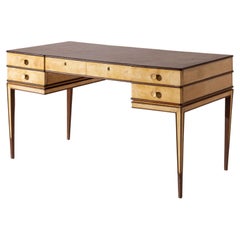 Gio Ponti double-sided desk in American walnut and parchment, Italy, 1930s