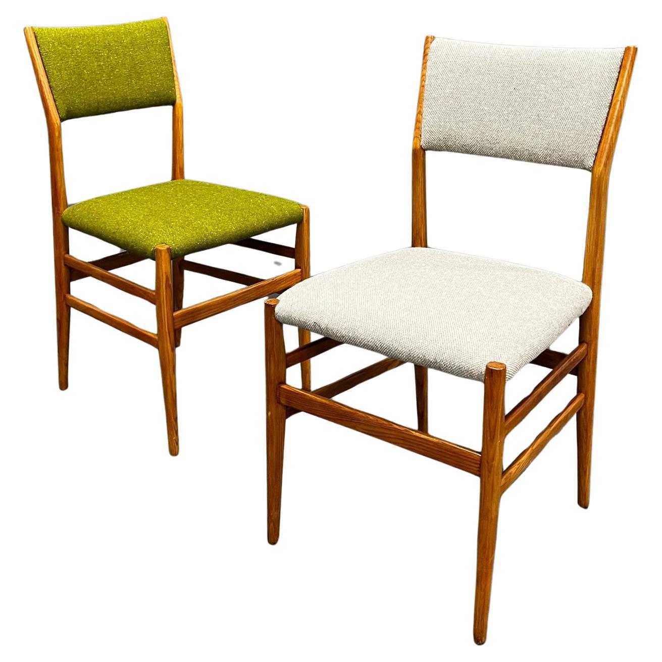 Gio Ponti for Cassina, Leggera Chair, Model 646, 1950s  

Ash frame, recently re-upholstered in Kvadrat 'Tonus' fabric, one available in green, one in pale grey.  

Good condition.  Grey chair has a small split and loss of wood to the top left
