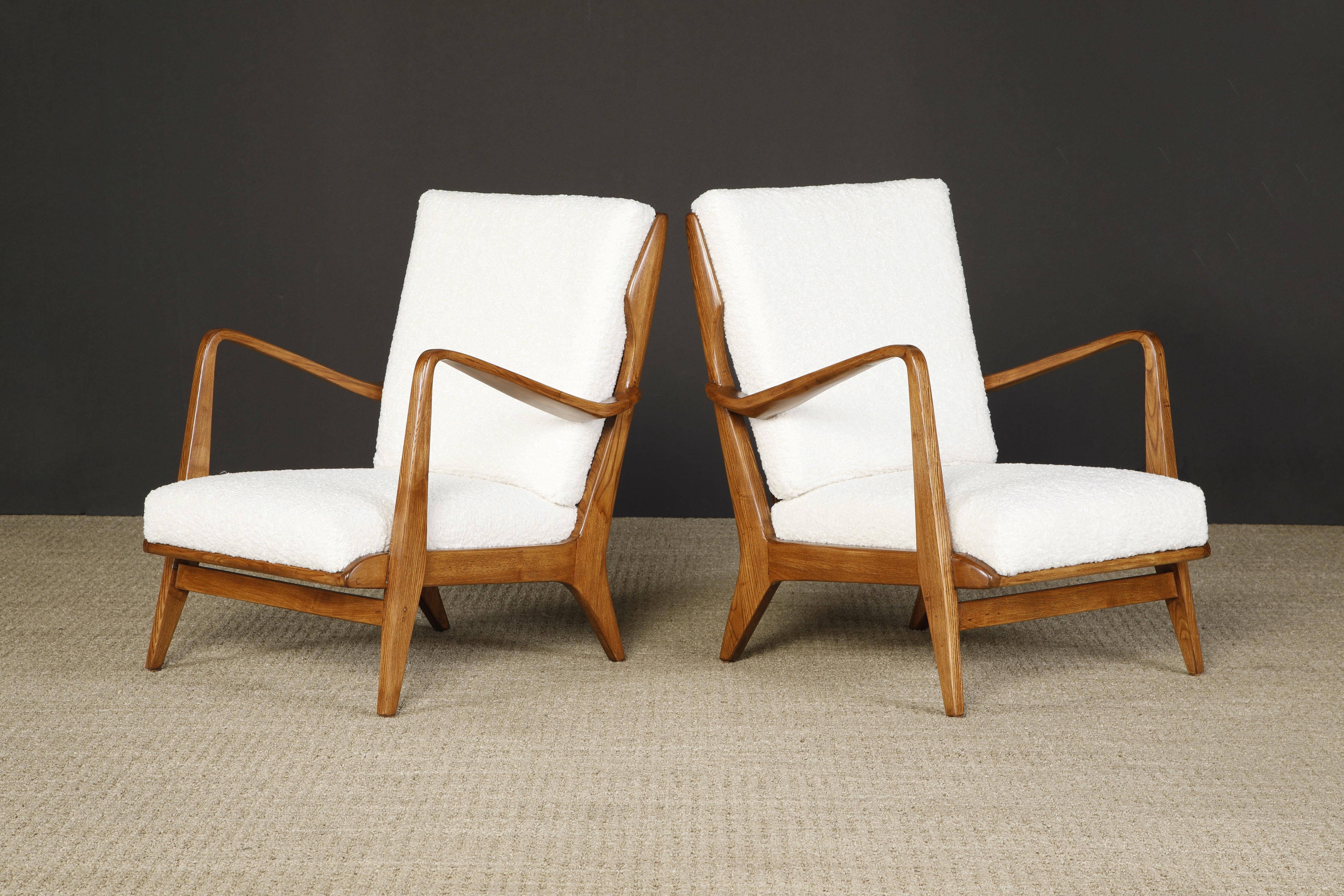 A rare pair of lounge armchairs by Gio Ponti for Cassina, circa 1950s, with reupholstered white bouclé fabric cushions, refinished elm frames with incredible wood grain, signature slatted backs and sculptured arms. 

Such an important design
