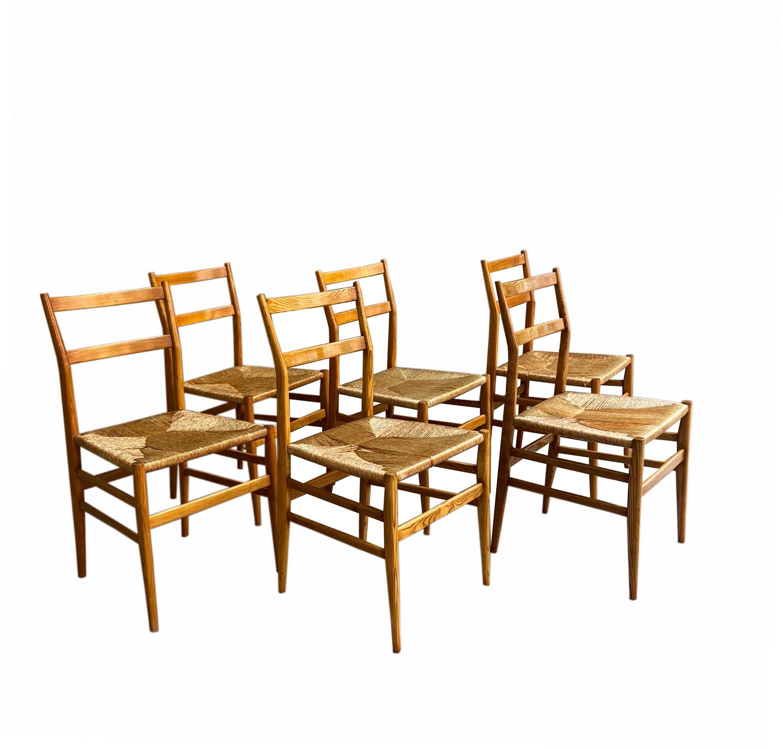 Set of 6 chairs Mod. Leggera. Light ash and straw. Leggera 646 produced by Cassina. Iconic design by Gio Ponti.