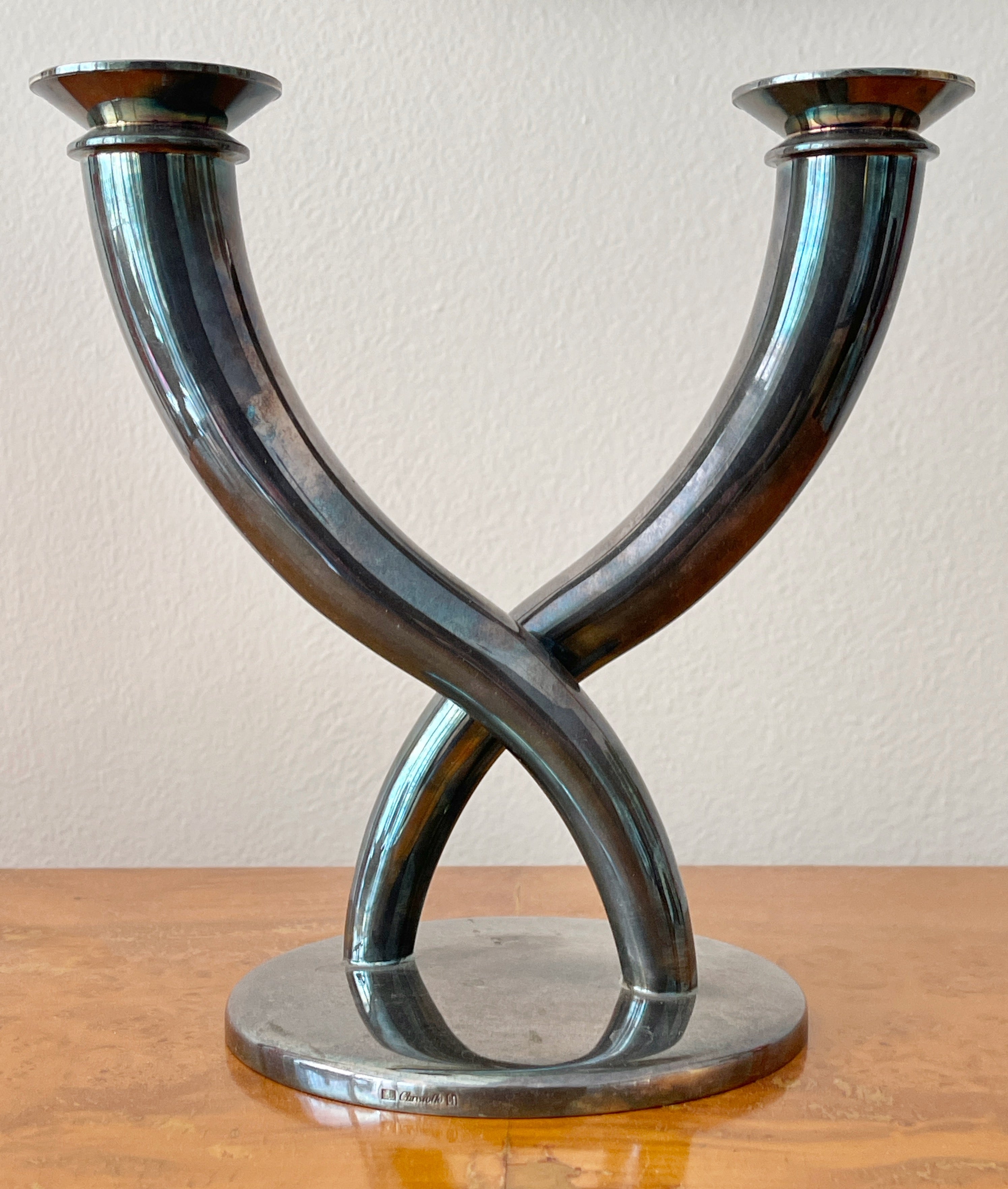 Silver plate two light candelabrum designed in 1928 by Gio Ponti for Christofle, re-issued circa 1980's.
Retains original Christofle box and pair of original clear glass bobeche.
We don't typically love patina.  We prefer silver to be polished to