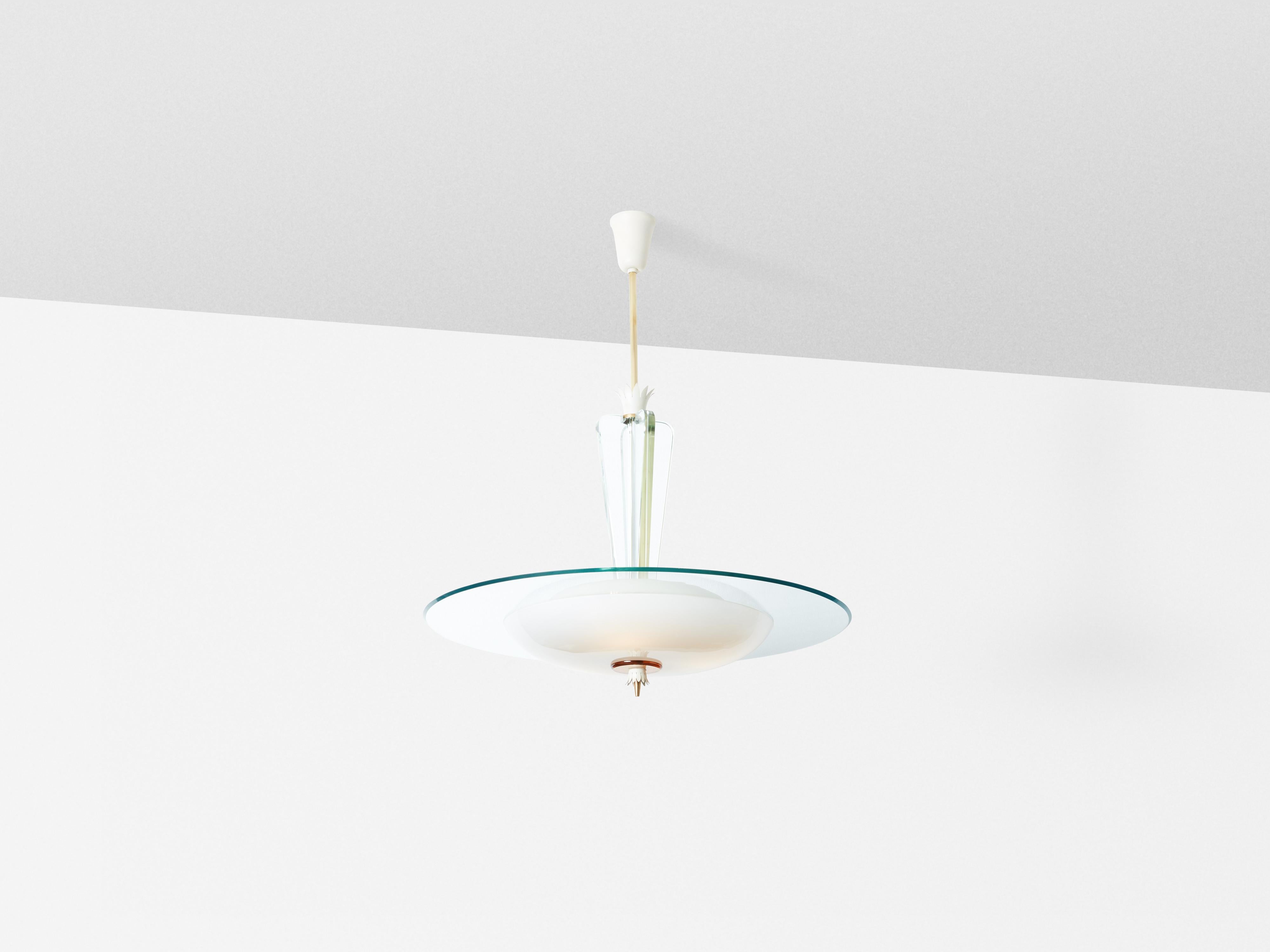 This superb chandelier, designed by Gio Ponti for Fontana Arte in 1938, is a variation of the Padelle chandelier designed in the early 1930s. It consists of a large flat disc of crystal glass integrated into a laid on a frosted glass rounded piece,