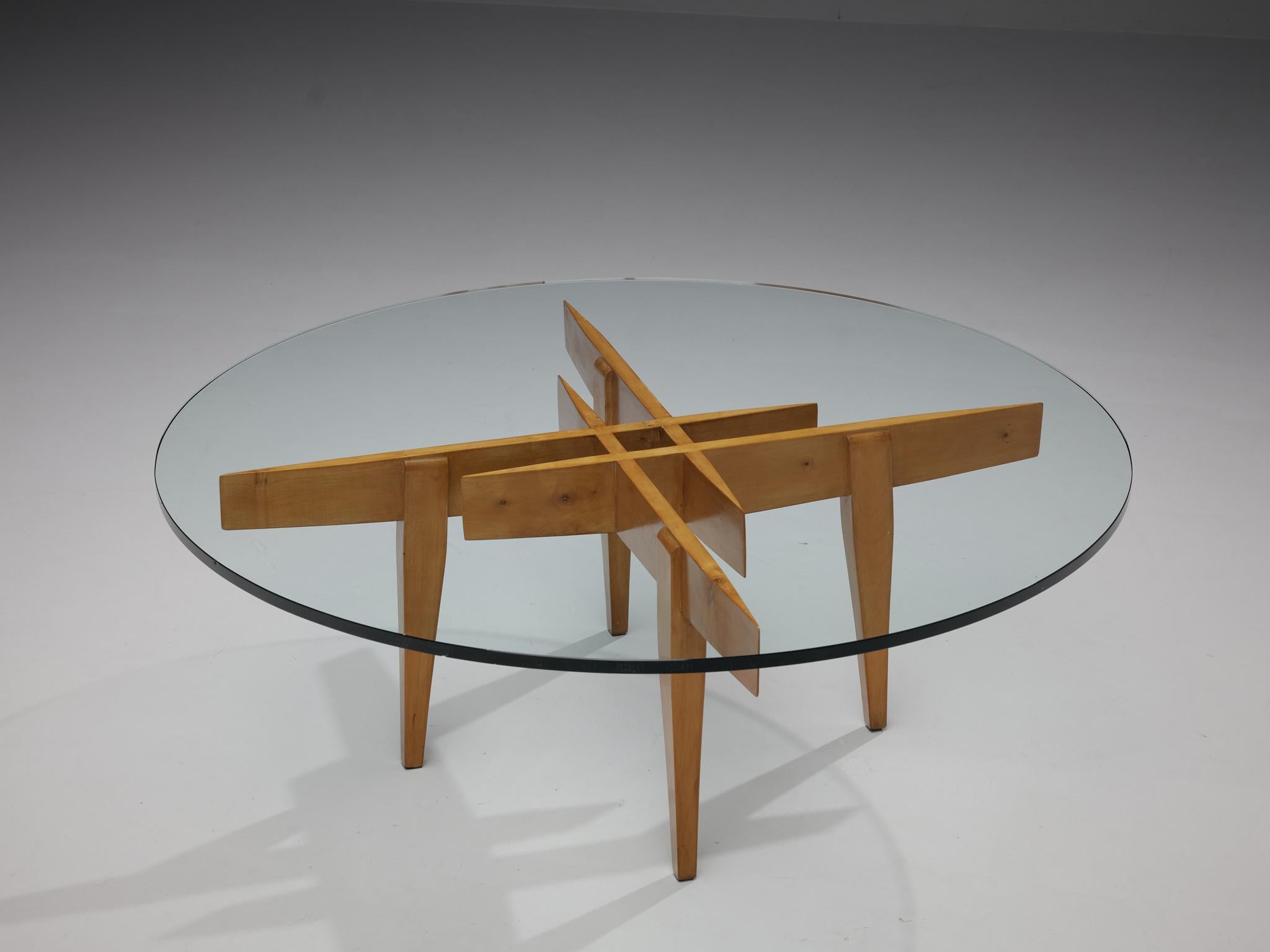 Gio Ponti for Giordano Chiesa, coffee table, maple, glass, Italy, 1950s

Coffee table by Gio Ponti in maple. The base is rather stunning. Four legs with horizontal slats are connected together is an artistic way. From above the geometric form of a