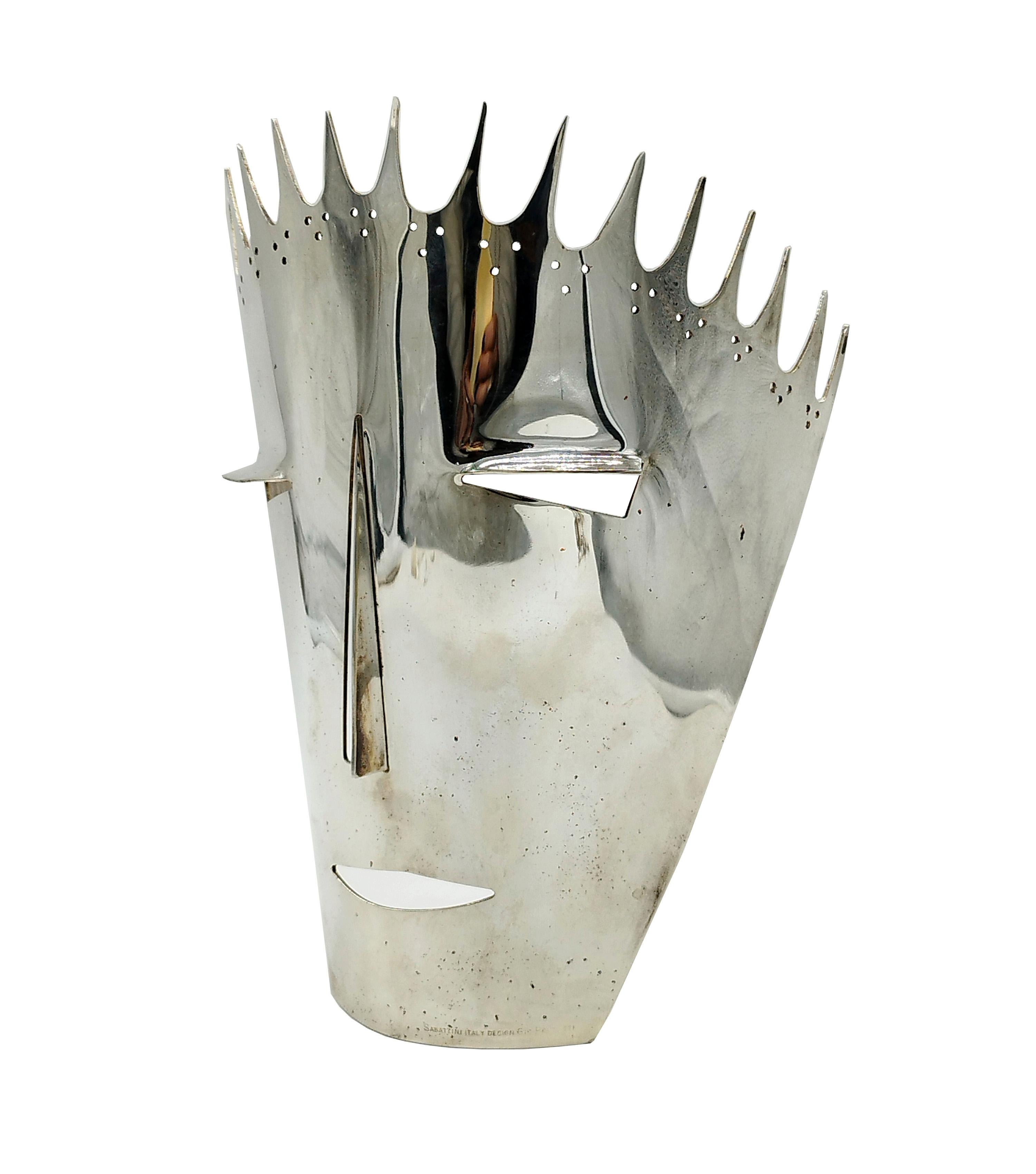 Sculpture and large decorative mask in perforated silver-plated metal 'The Devil' designed by Gio' Ponti and produced by the firm Lino Sabattini,
Limited edition and signed at the bottom.