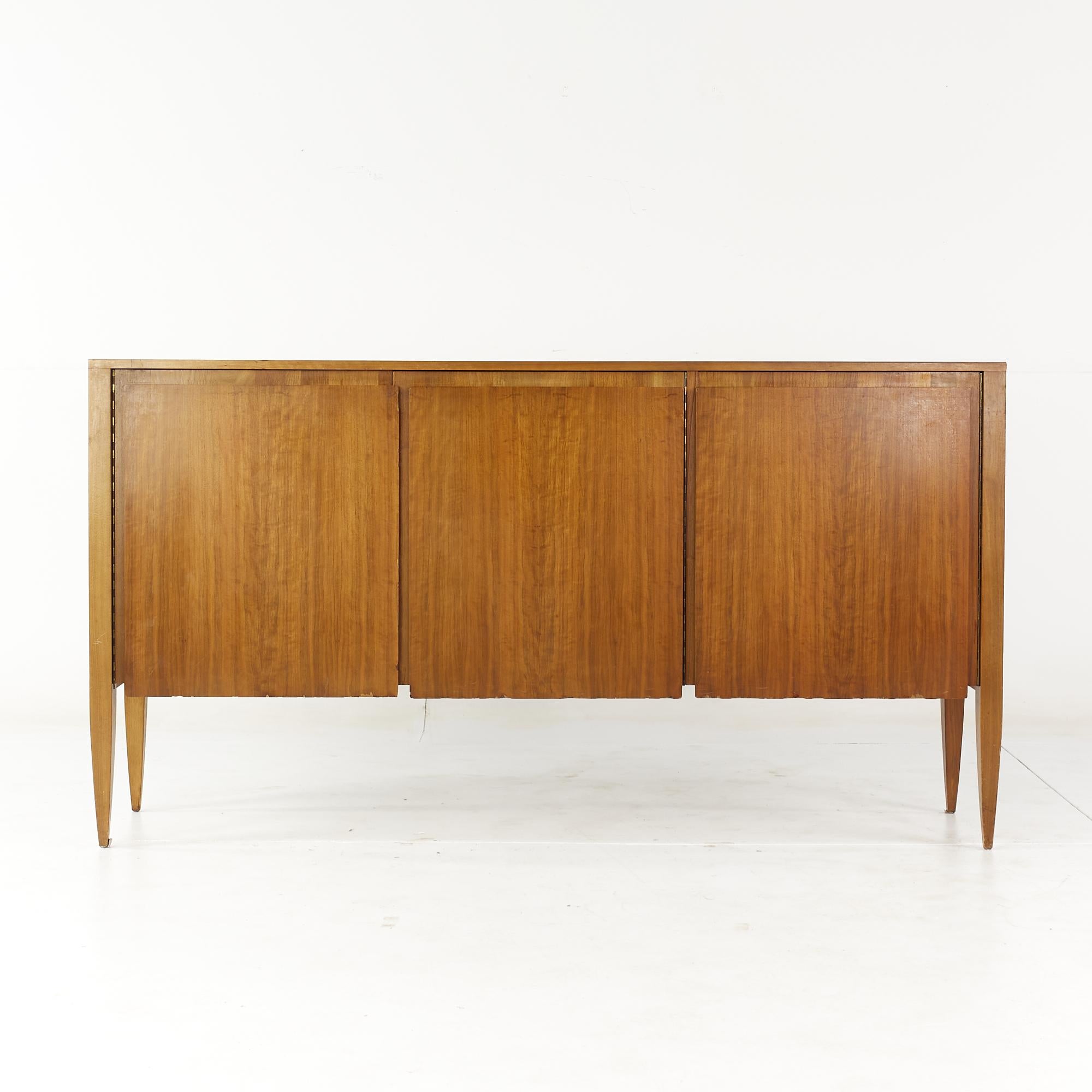 Gio Ponti for Singer and Sons Mid Century Model 2160 walnut cabinet

This cabinet measures: 69.75 wide x 19 deep x 37.5 inches high

All pieces of furniture can be had in what we call restored vintage condition. That means the piece is restored
