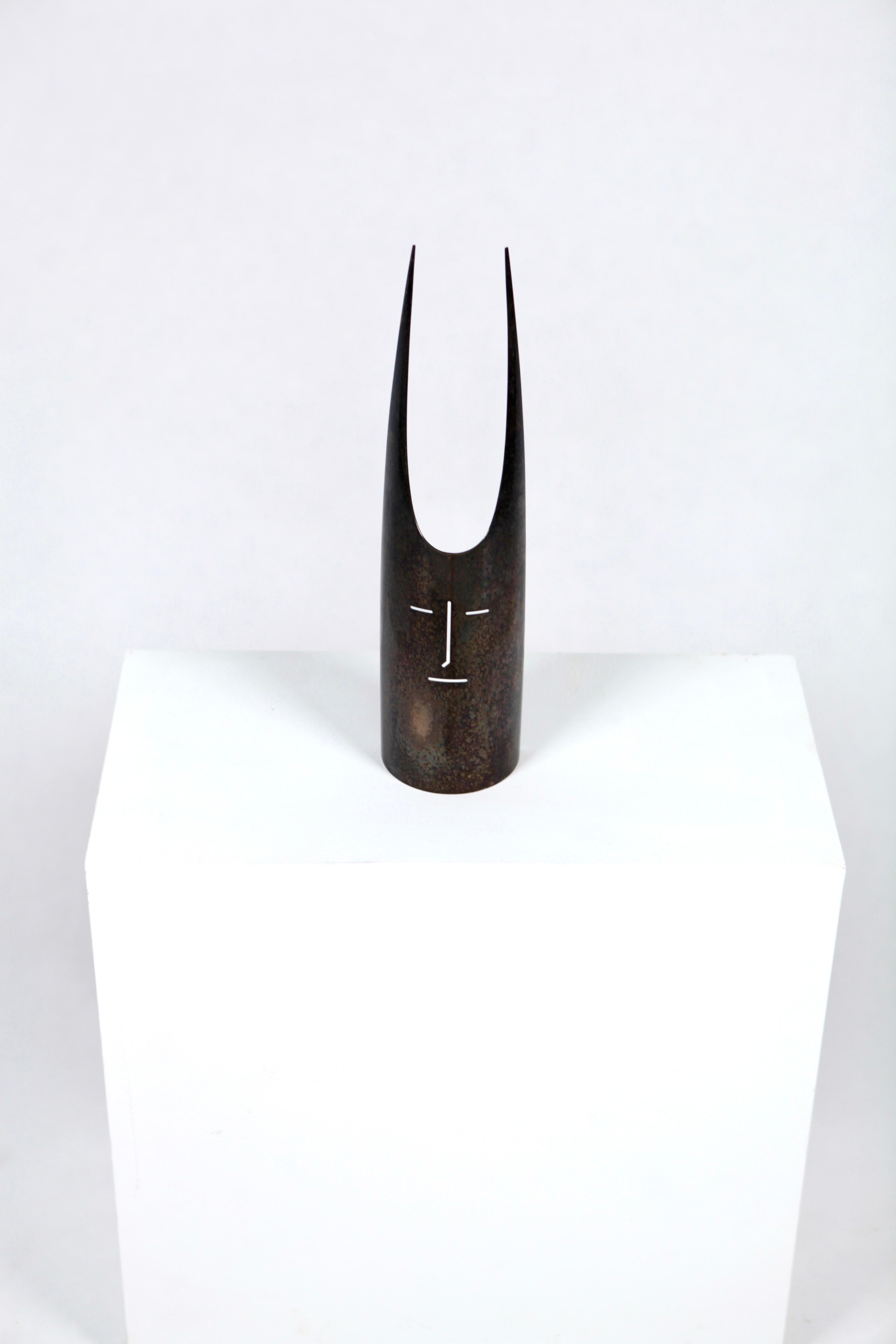 A silver plated half mask to be used as a wine bottle cover for table decoration, designed by Gio Ponti and manufactured by Sabattini, in Italy 1978.
We left the silver tarnished, but may be cleaned and polished easily.
Signed at the bottom: