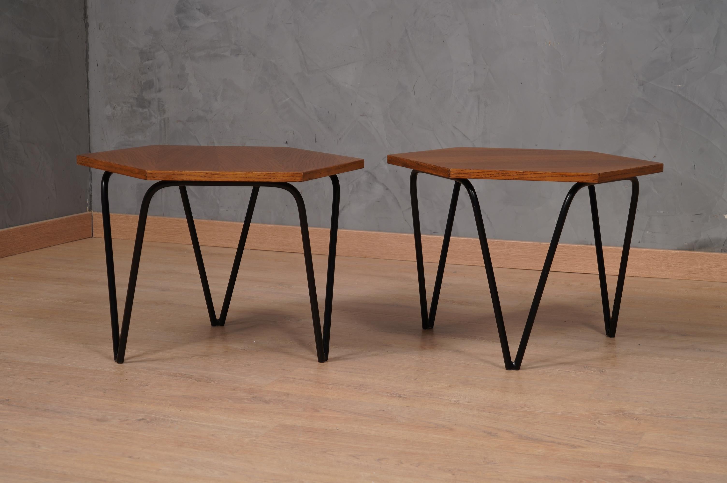 Gio Ponti splendid pair of hexagonal side tables manufactured by ISA. Elegant linear classics, and so on and so forth, one-of-a-kind furniture pieces. Icons of Italian design, the distinctive feature is the sense of lightness and grace.

This pair