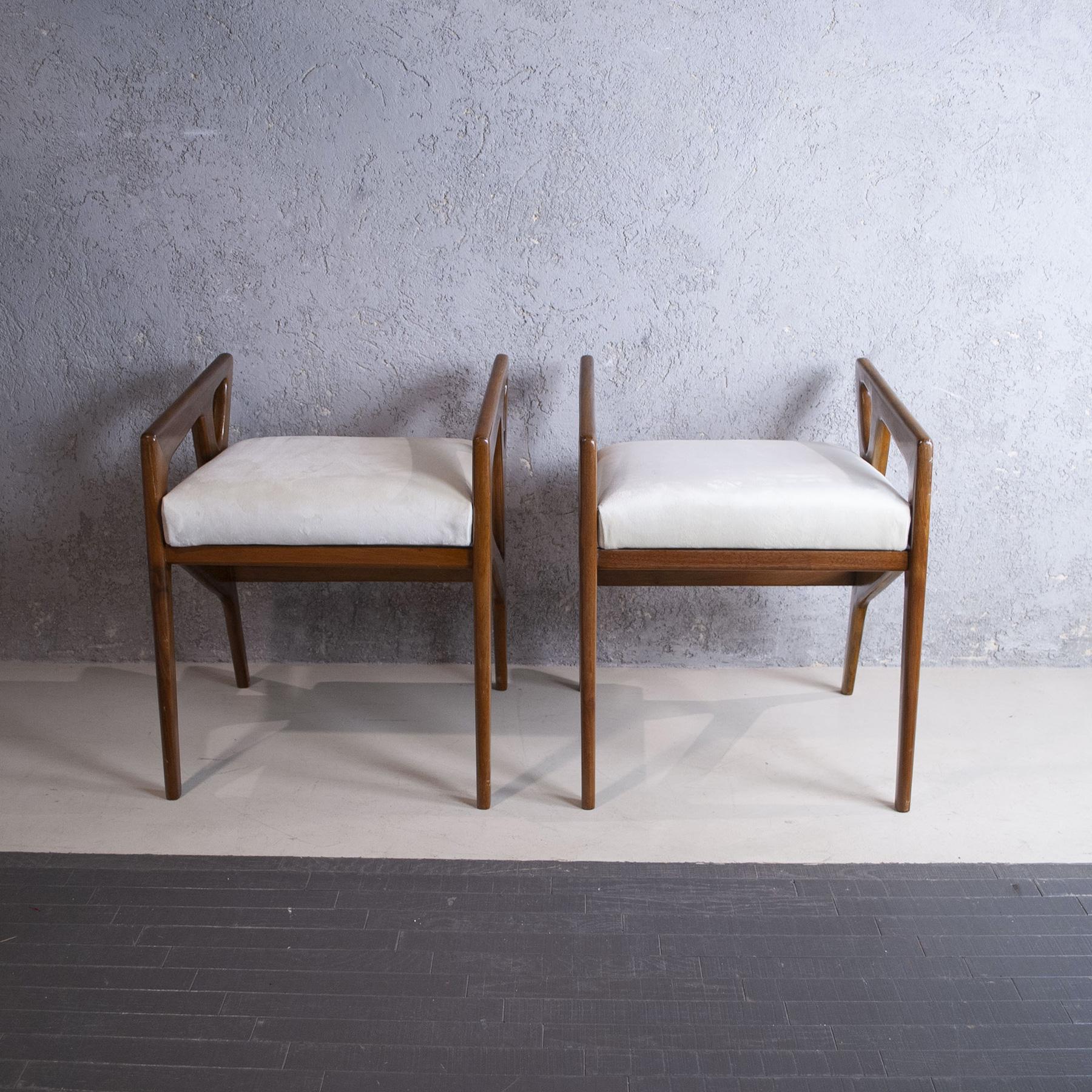 Bar stools 1950s wooden frame designer Gio Ponti.

Gio Ponti was born in Milan in 1891. He graduated in architecture in 1921 and from 1923 began his work as a designer for the Richard Ginori ceramics industry, where he revamped production.
It was