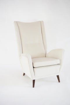 Gio Ponti ivory wingback armchair, model n. 512 by Cassina, 1950