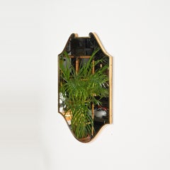 Gio Ponti, grande specchio italiano a forma di scudo in ottone massiccio, Italia, anni '40