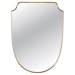 Gio Ponti - Grande specchio a forma di scudo in ottone massiccio, Italia, anni '50