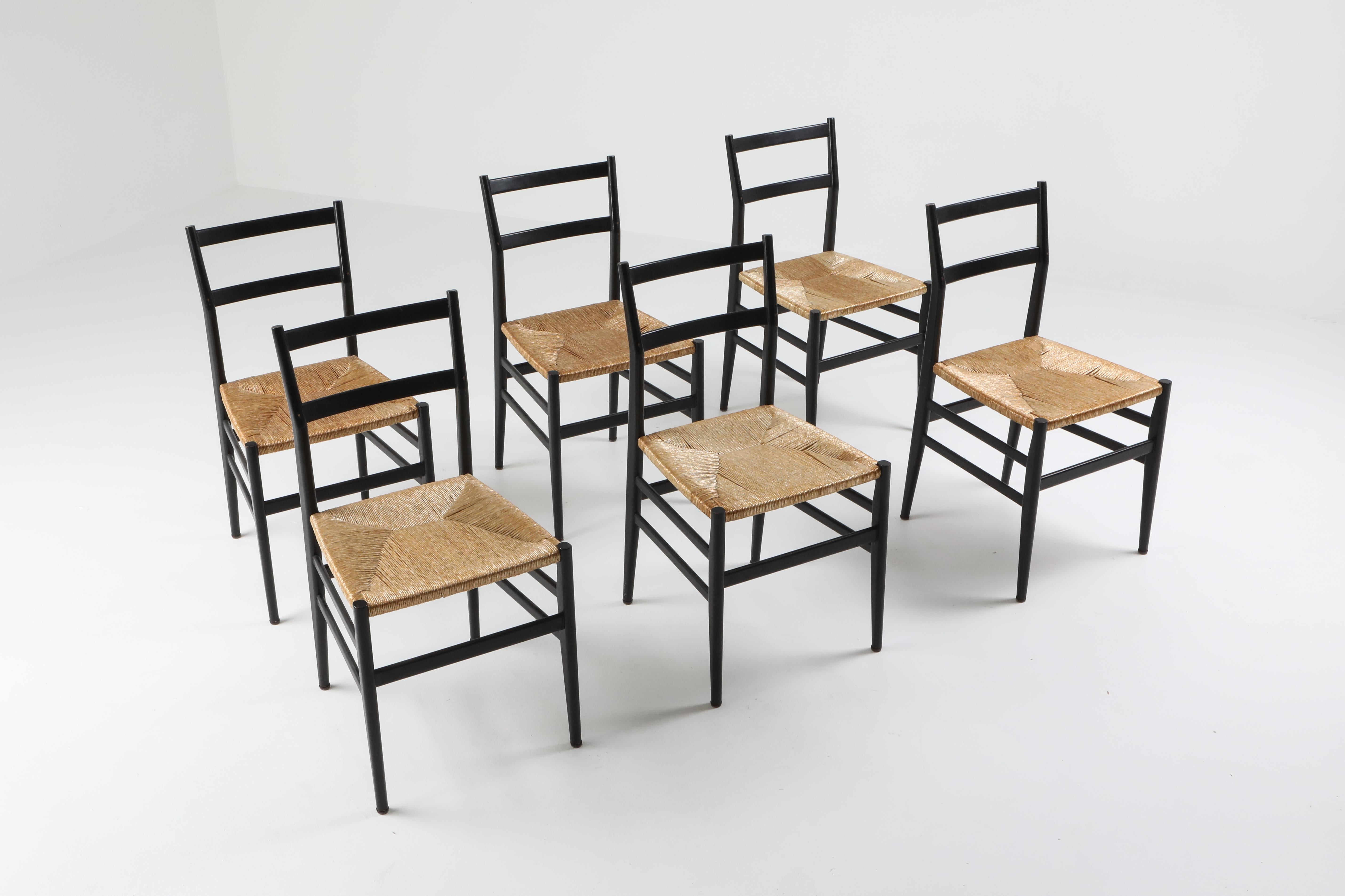 Rope and black ash, Gio Ponti, Cassina, set of six 

Six iconic Leggera chairs, black lacquered solid ash tree and braided straw seats, designed by Architect Gio Ponti in the 1951, produced by Cassina. The straw seats are in perfect condition. The