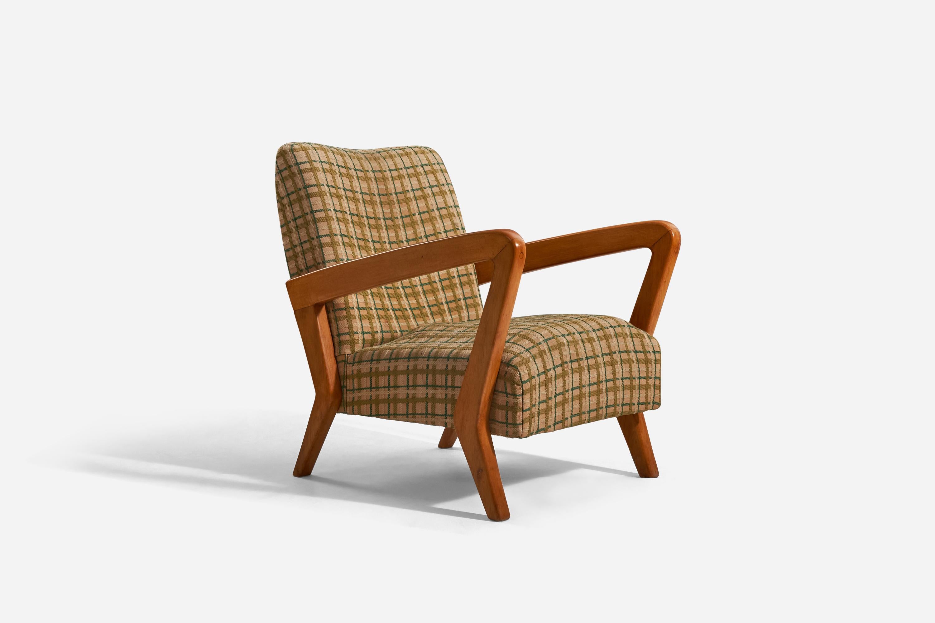 A walnut and fabric lounge chair designed and produced by Gio Ponti, Italy, 1950s. 

Together with autenticity certificate from the Gio Ponti Archives.