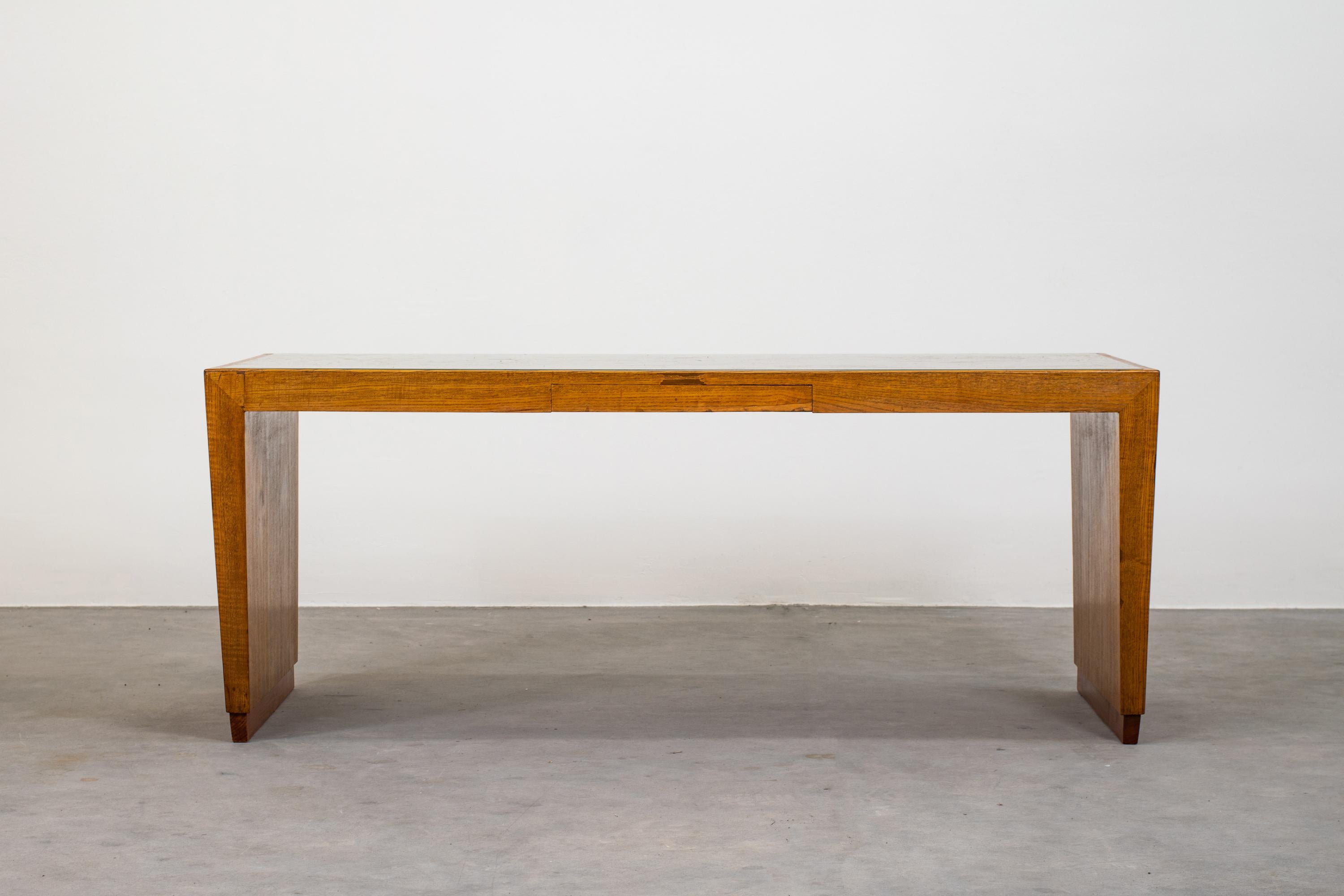 Low rectangular shaped table with a frontal drawer realized in wood with a glass on top, originally designed for the offices of the Banca Nazionale del Lavoro (BNL) Italian manufacturer from the 1950s. 

Gio Ponti was an icon of the modernist