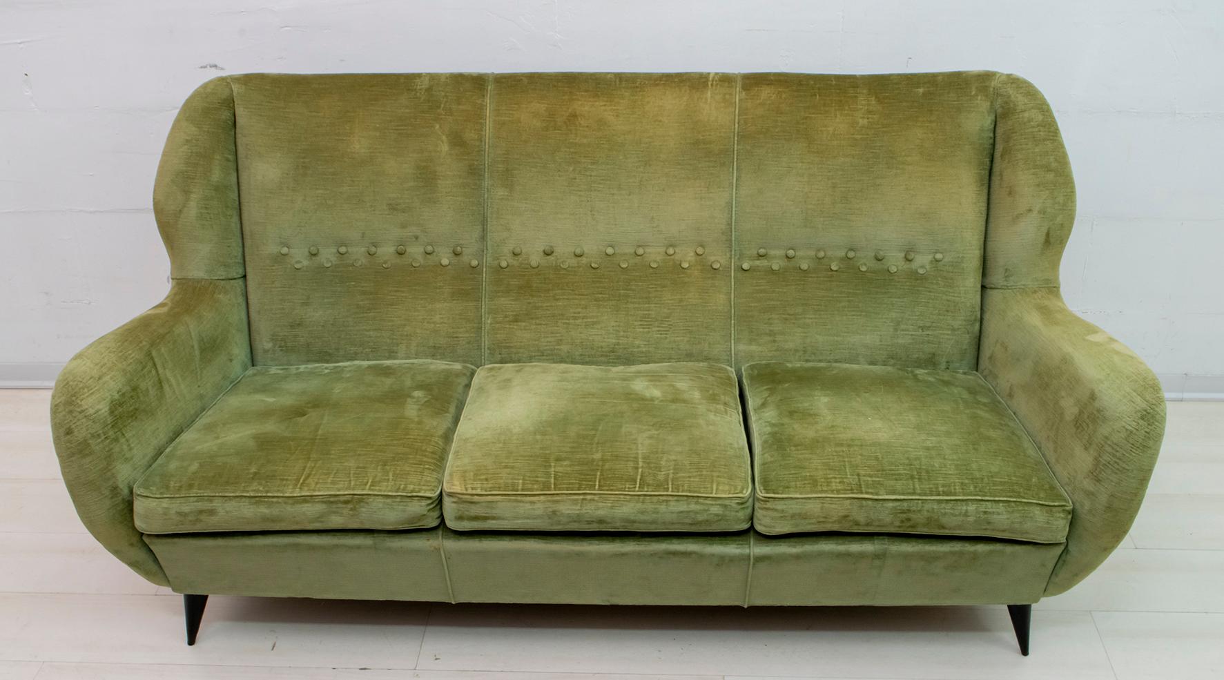 Elegant and splendid three-seat high-back sofa by Gio Ponti, 1950s, for ISA Edizioni, Bergamo. Carved profile, refined lines, sensual and deep comfort. The upholstery is original in linen velvet. As shown in the photos, normal wear.


  