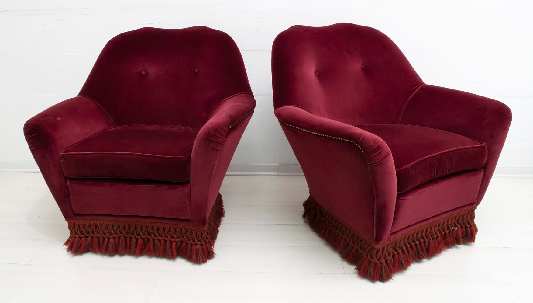 A set of two rare armchairs by Gio Ponti for Home and Garden, 1950.
Covered in purple-red velvet.

