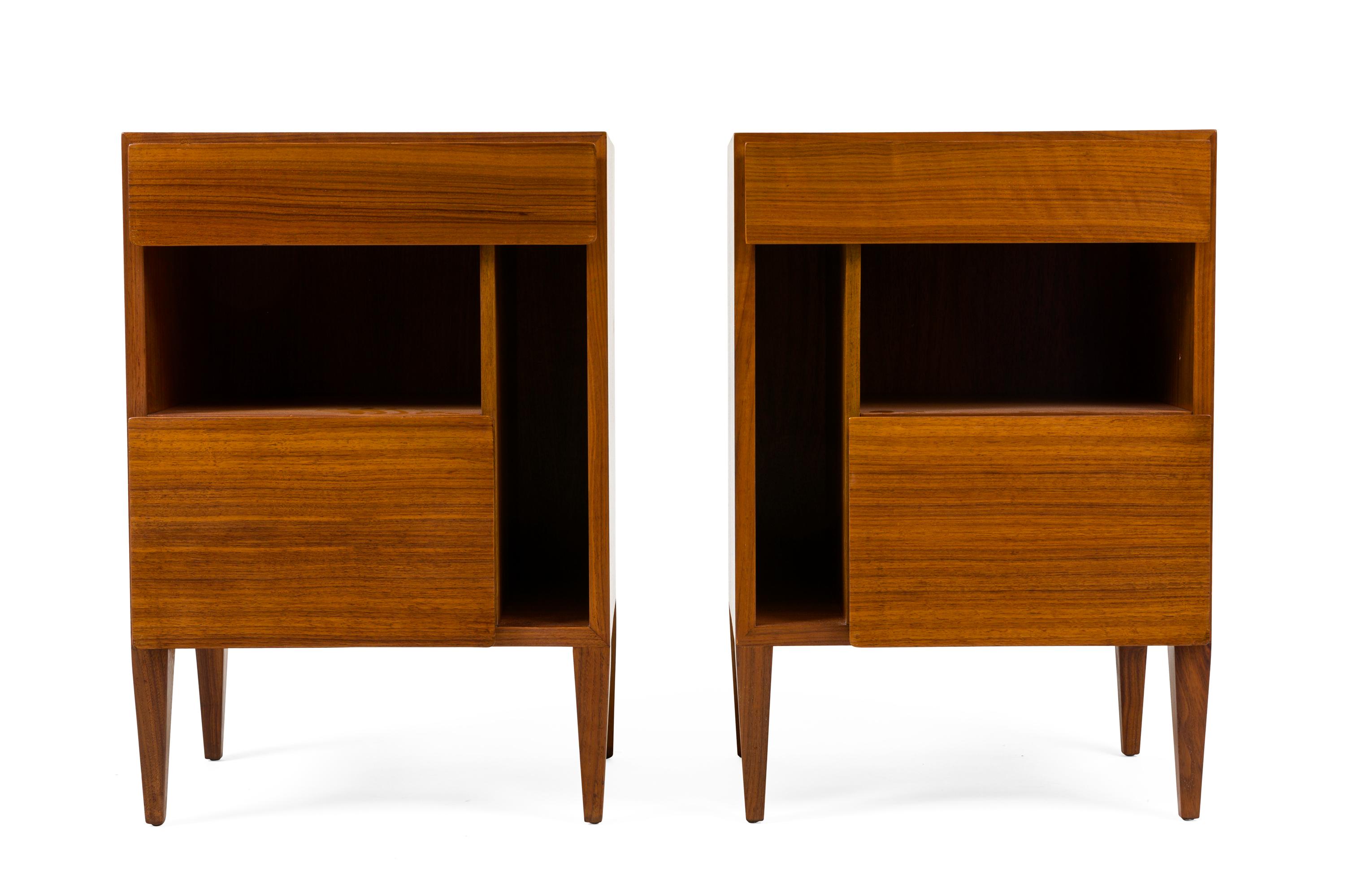 An outstanding pair of nightstands by Gio Ponti. They feature one drawer and one door concealing storage.
