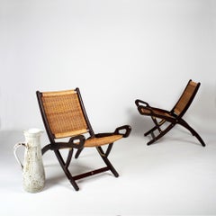 Gio Ponti Ninfea Coppia di sedie pieghevoli in rattan per Fratelli Reguitti, Italia anni '50