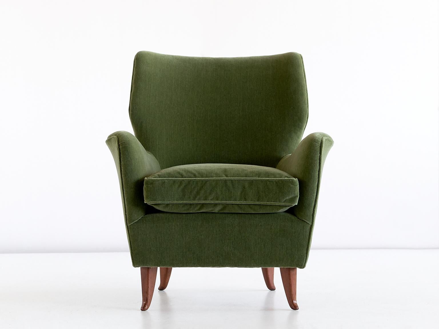 olive green armchairs