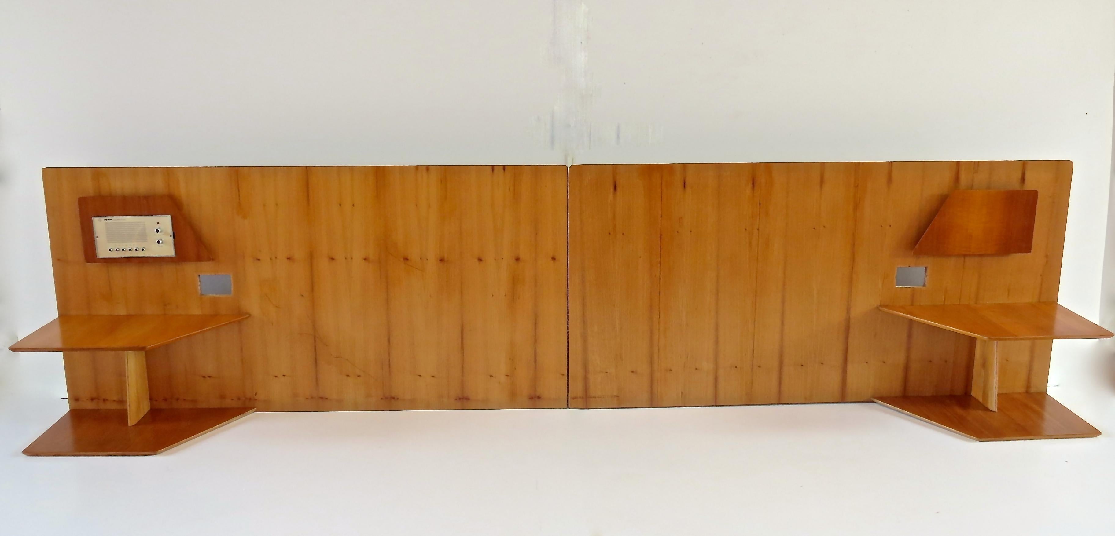 A pair of headboards by Gio Ponti from the furniture of the Hotel Royal in Naples, 1955. 
Manufactured by Giordano Chiesa by Dassi. 
Ash with two tiered shelving, magazine rack, space for lighting and radio unit ( not working).
Good condition.