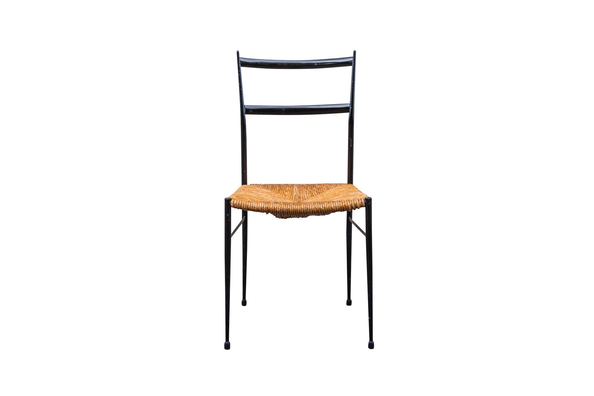 Gio Ponti (1891-1979), Pair of Superleggera model chairs,
Black lacquered iron structure and straw seat,
Slightly inclined backrest, rubber ball feet,
circa 1960, Italy.

Measures : Width 41 cm, Depth 42 cm, Height 84 cm.

Gio Ponti (November 18,