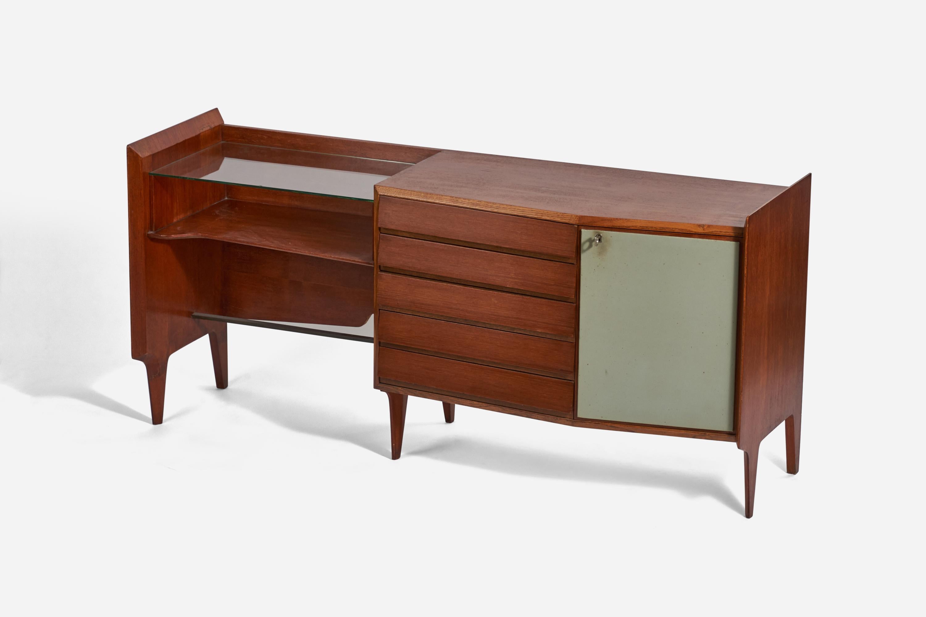 A mahogany, glass, vinyl and brass sideboard designed by Gio Ponti and probably produced by Dassi, Italy, 1950s. 
   