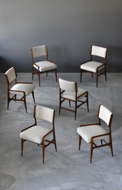 Chaises à manger rares de Gio Ponti:: en noyer:: Boucle by Figli di Amedeo Cassina:: années 1960