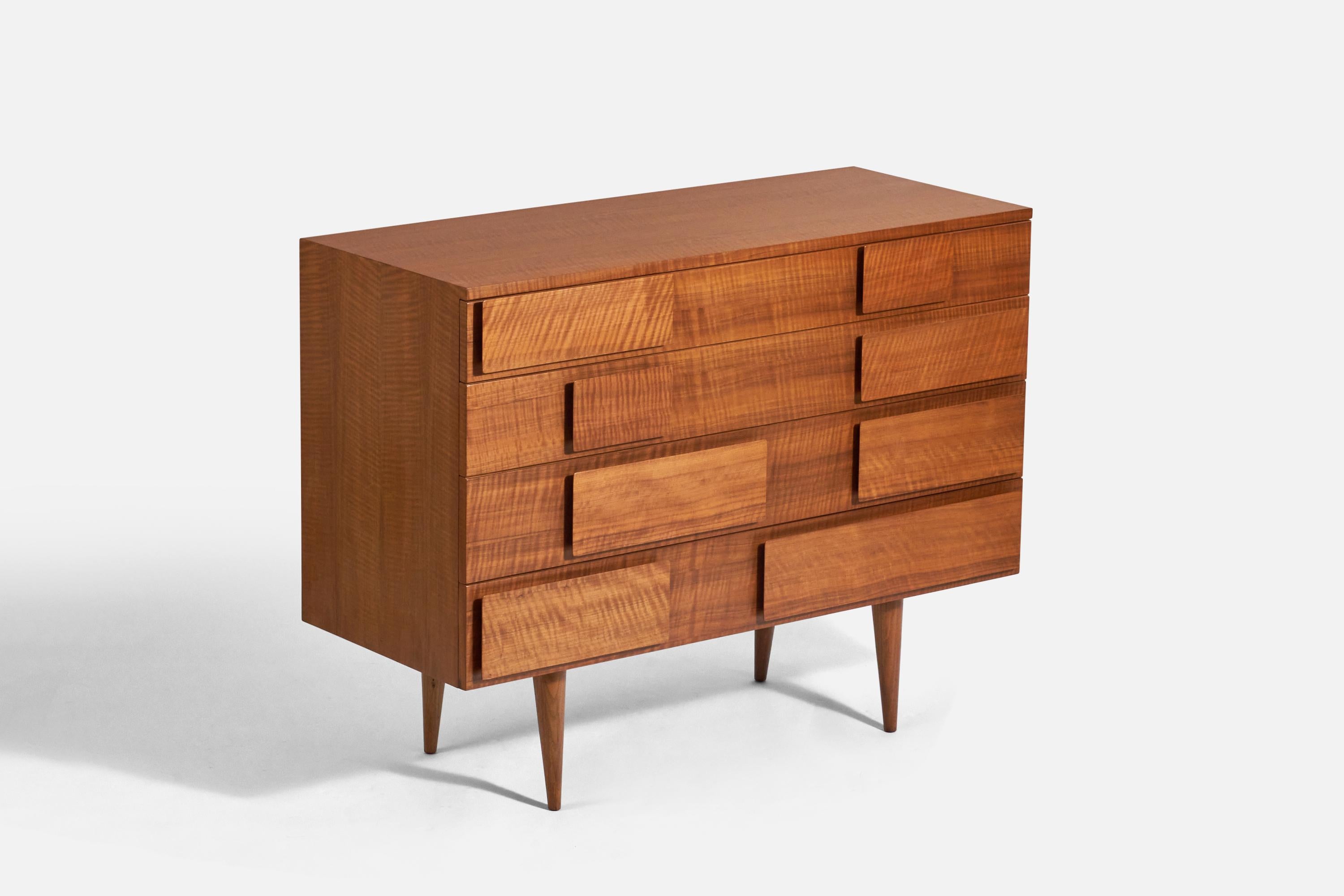 A walnut dresser designed by Gio Ponti and produced by M. Singer & Sons, New York, America, 1950s. Labeled. 

