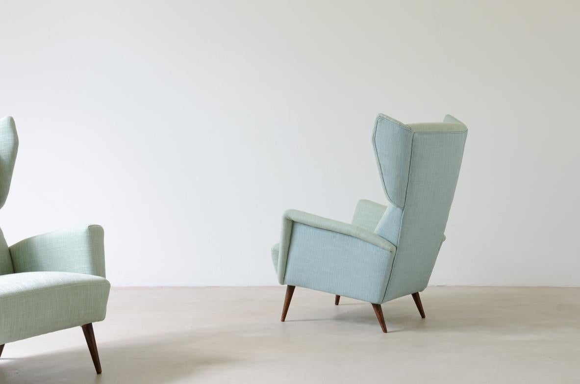 20th Century Gio Ponti, rare pair of armchairs Mod.820 in wood and upholstered fabric For Sale