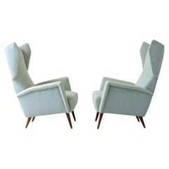 Used Gio Ponti, rare pair of armchairs Mod.820 in wood and upholstered fabric