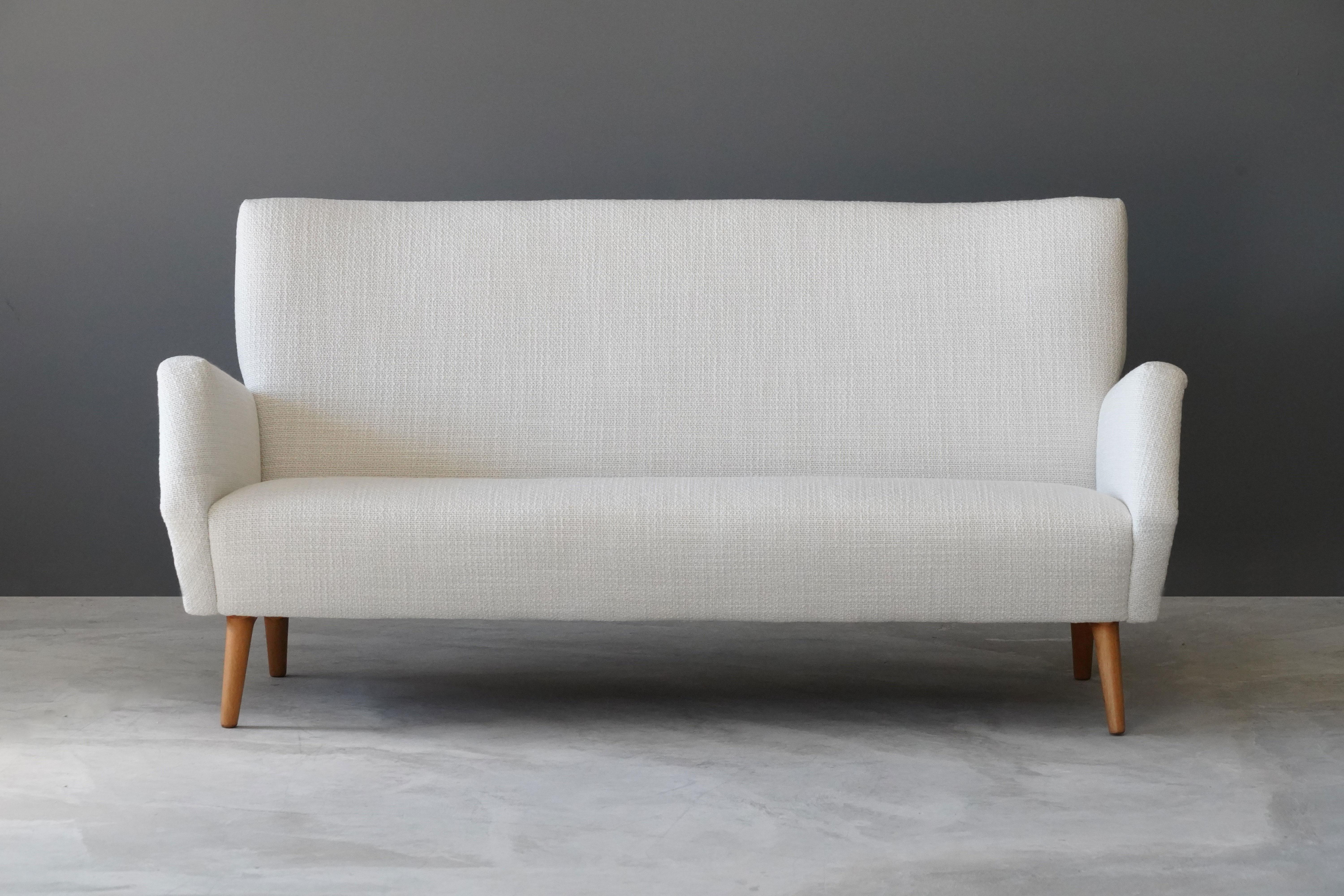 white fabric sofa