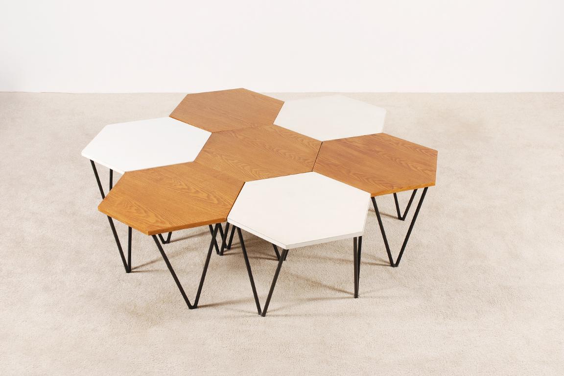 Set of seven modular coffee tables designed by Gio Ponti for I.S.A. Italy, circa 1950. Here we propose a rare complete set of seven coffee tables which combined together form a large coffee table.
Hexagonal honeycomb shape and triangular black
