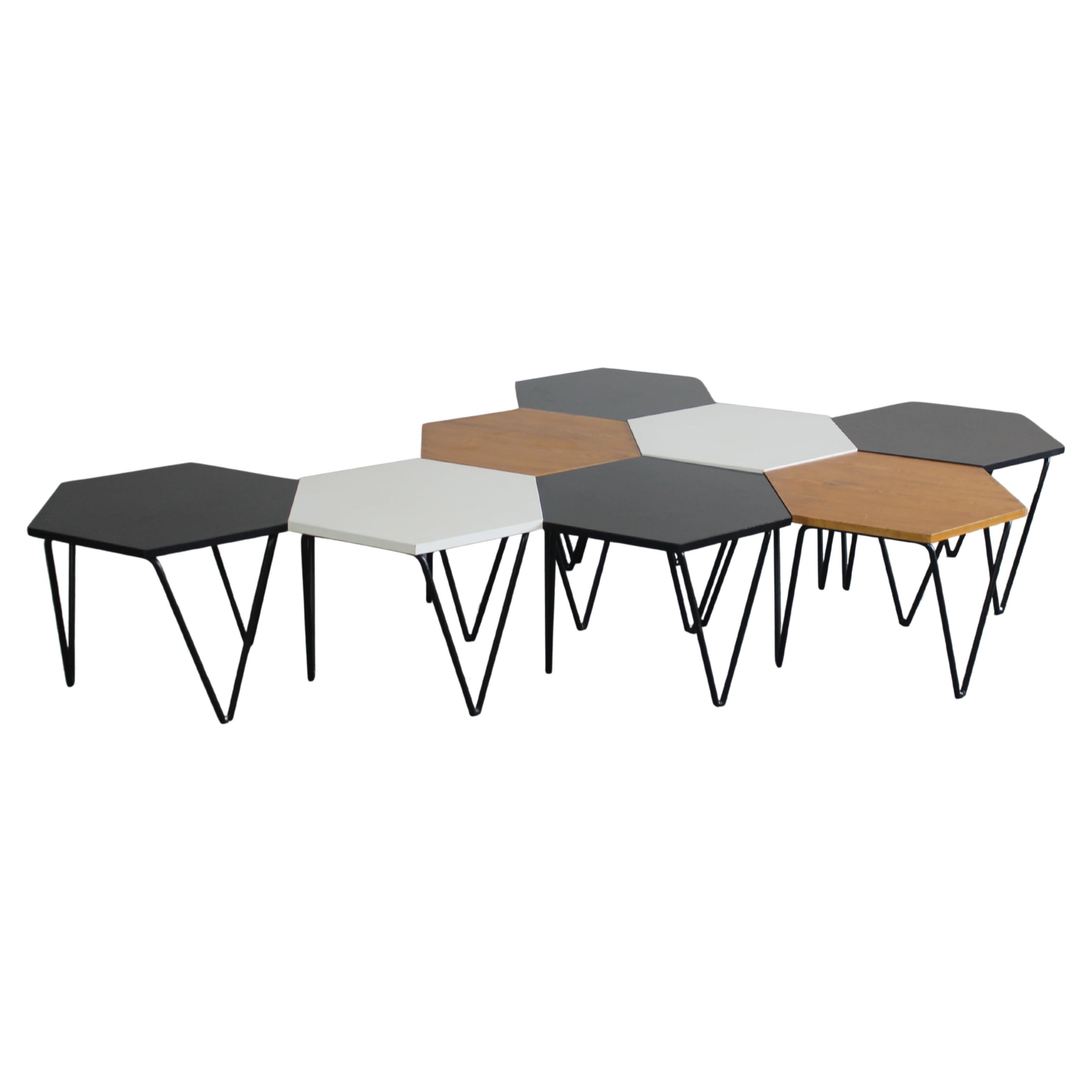 Gio Ponti Conjunto de ocho mesas de centro hexagonales de madera y metal I.S.A. Años 50